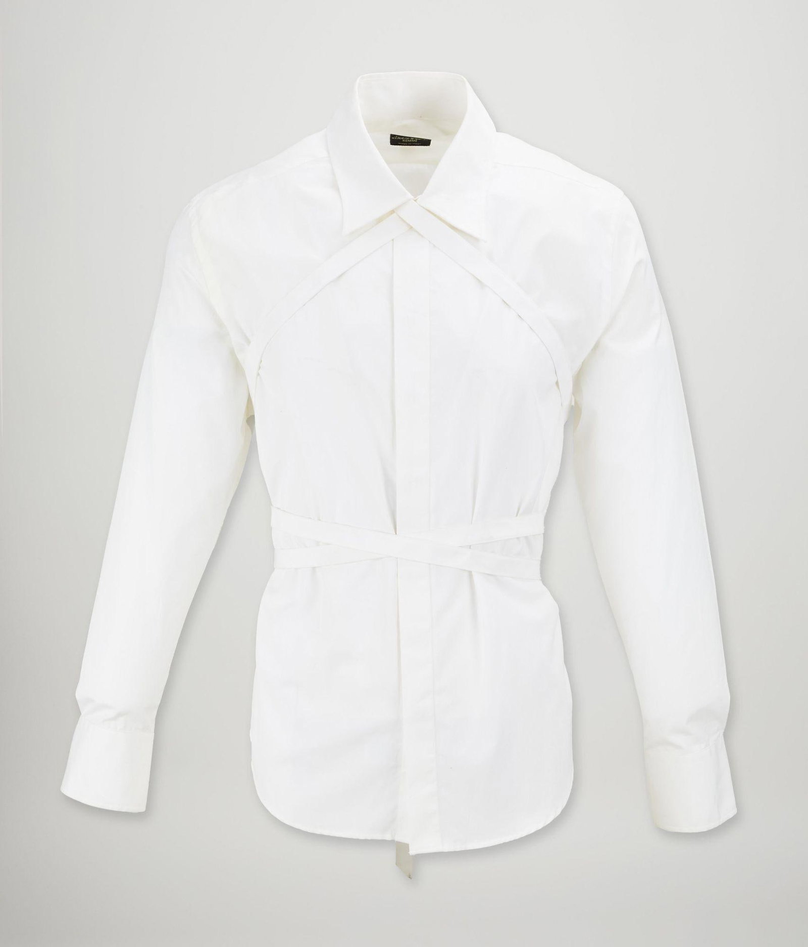 Jean Paul Gaultier | Homme 2000s White Shirt: A Circa 2000s Jean Paul Gaultier 100% cotton white dress shirt with semi detached extra long tie belt emanating from underneath the back of the collar. The tie allows for the shirt to be worn a multit