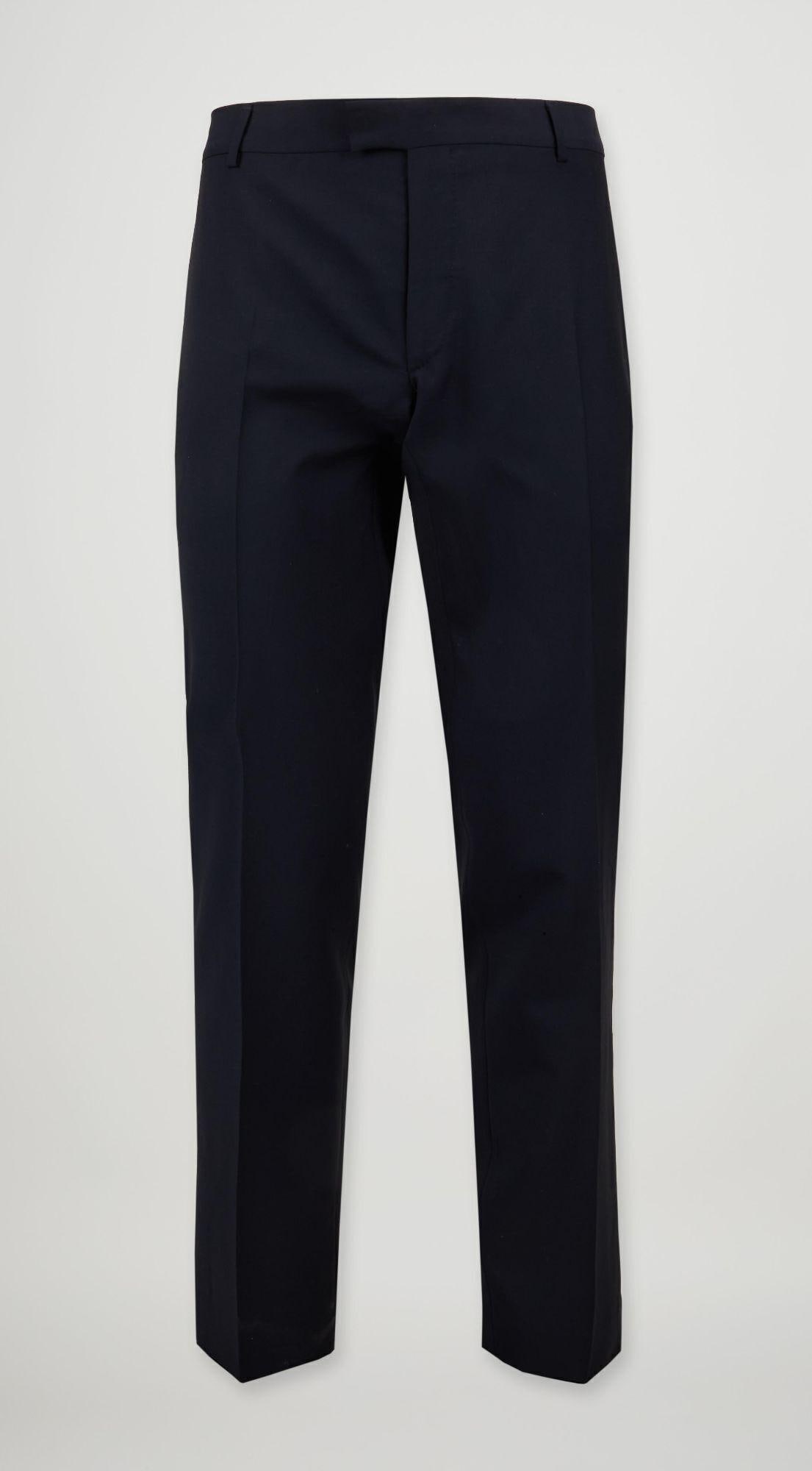 Alexander McQueen | 2010s Classic Navy Blue Trousers: A fashion staple and must have pair of navy blue classicly styled trousers by beloved British designer Alexander McQueen circa the 2010's. Constructed of a lightweight wool blend fabric that is un