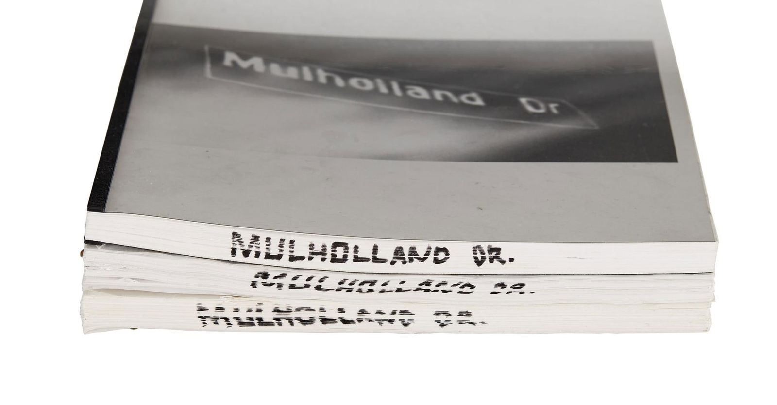 David Lynch | "Mulholland Drive" Scripts: A group of three scripts from the production of David's Lynch neo-noir, Mulholland Drive (Universal, 2001). The first script is 96 pages, dated 12/23/98, with "Mary" handwritte