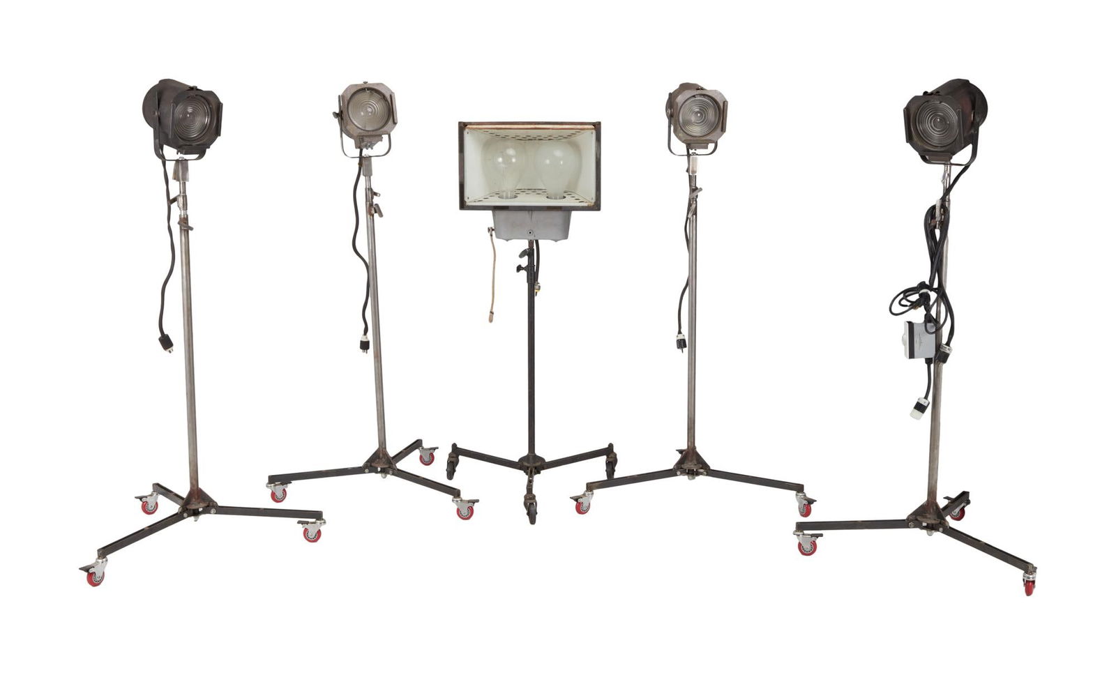 David Lynch | Five Vintage Standing Stage Lights: A set of five vintage standing stage lights, four matching, from the home of David Lynch. The four matching fresnel lights are UL E-31501 803C Category No. 65 Stage Type Fixtures; 120 VAC, 750 Natt, T