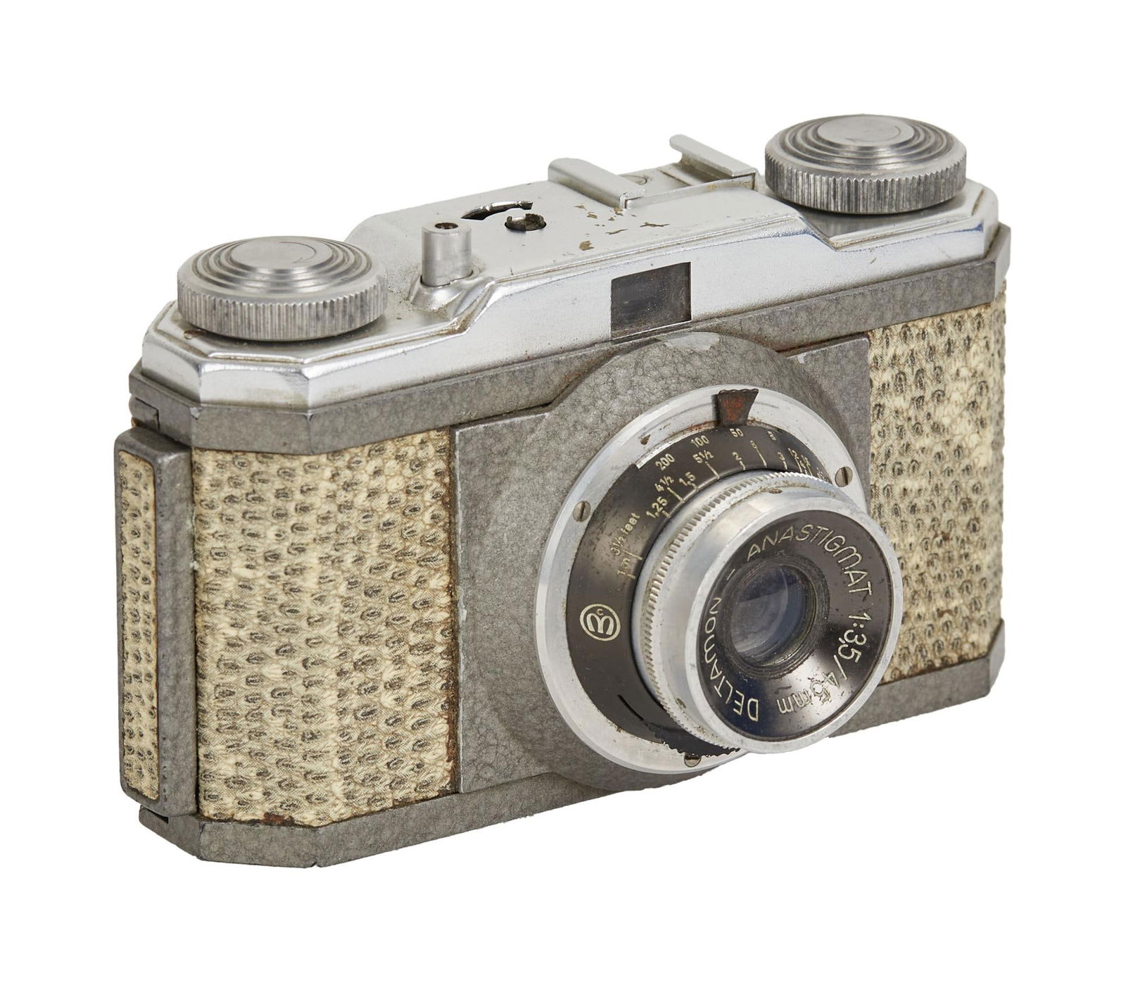 David Lynch | Montana Luxus Snakeskin Camera: A vintage Montanus Montana 35mm, German, viewfinder camera, Luxus model, covered in snakeskin. The camera features a Deltamon - Anastimat 1:3,5/45mm lens. From the home of David Lynch, who once f