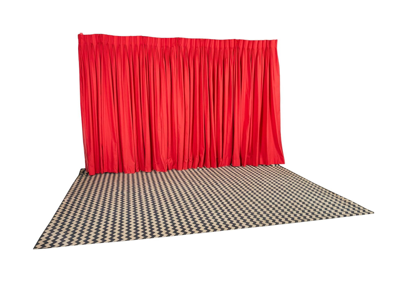 David Lynch | "Twin Peaks" Black Lodge Style Red Curtain and Zig-Zag Rug: David Lynch's personally owned red curtain and black and white zig-zag rug, in the style of the Black Lodge from Twin Peaks (ABC, 1990 - 1991). The curtain is cotton featuring drapery pl
