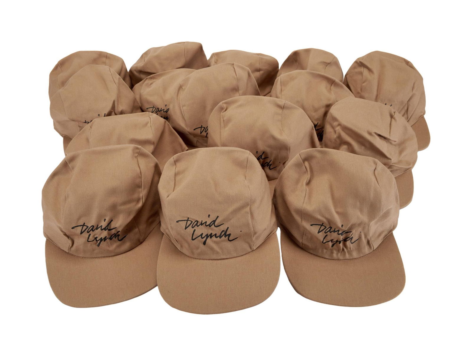 David Lynch | Tan "David Lynch" Baseball Caps: A group of 15 tan "David Lynch" baseball caps (no size), from Lynch's home. A group of 15 tan "David Lynch" baseball caps (no size), from Lynch's home. PROVENANCE From The