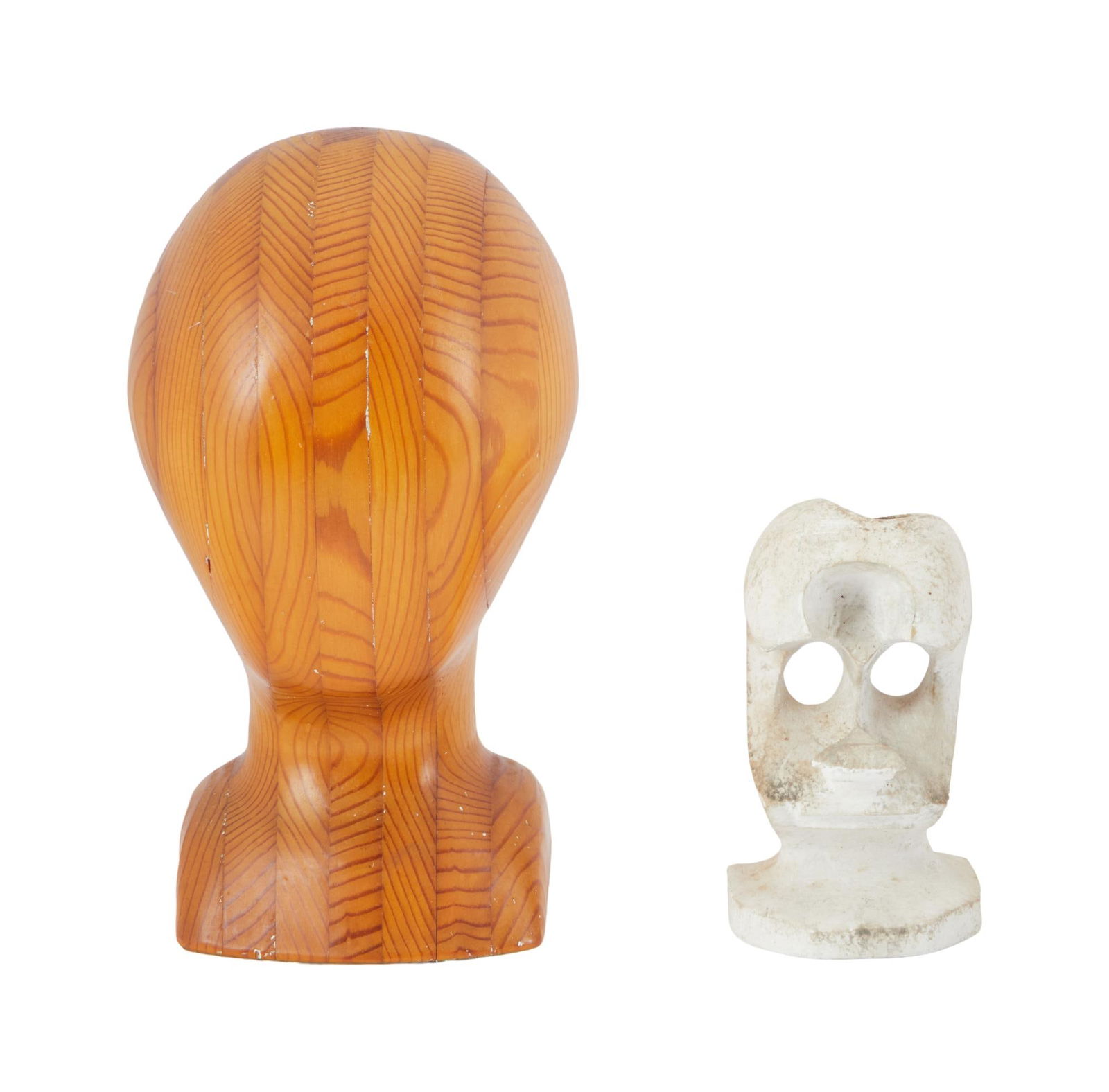 David Lynch | Homemade Figural Head Sculptures: Two figural head sculptures: one plaster modernist-style sculpture, labeled to the underside "For David, who made it," and one layered wood sculpture, labeled to the underside "Lynch Br