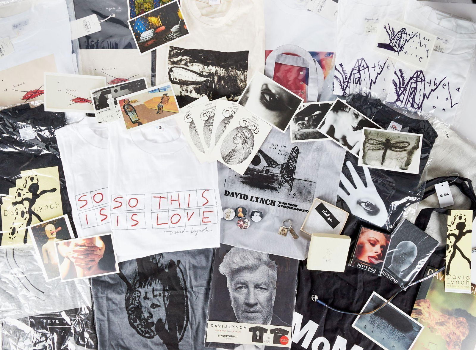 David Lynch | Art Show Ephemera Archive: An assortment of t-shirts, tote bags, posters, flyers, brochures, and other ephemera relating to David Lynch's varied international art exhibits and gallery shows. An assortment of t-shirts, tote