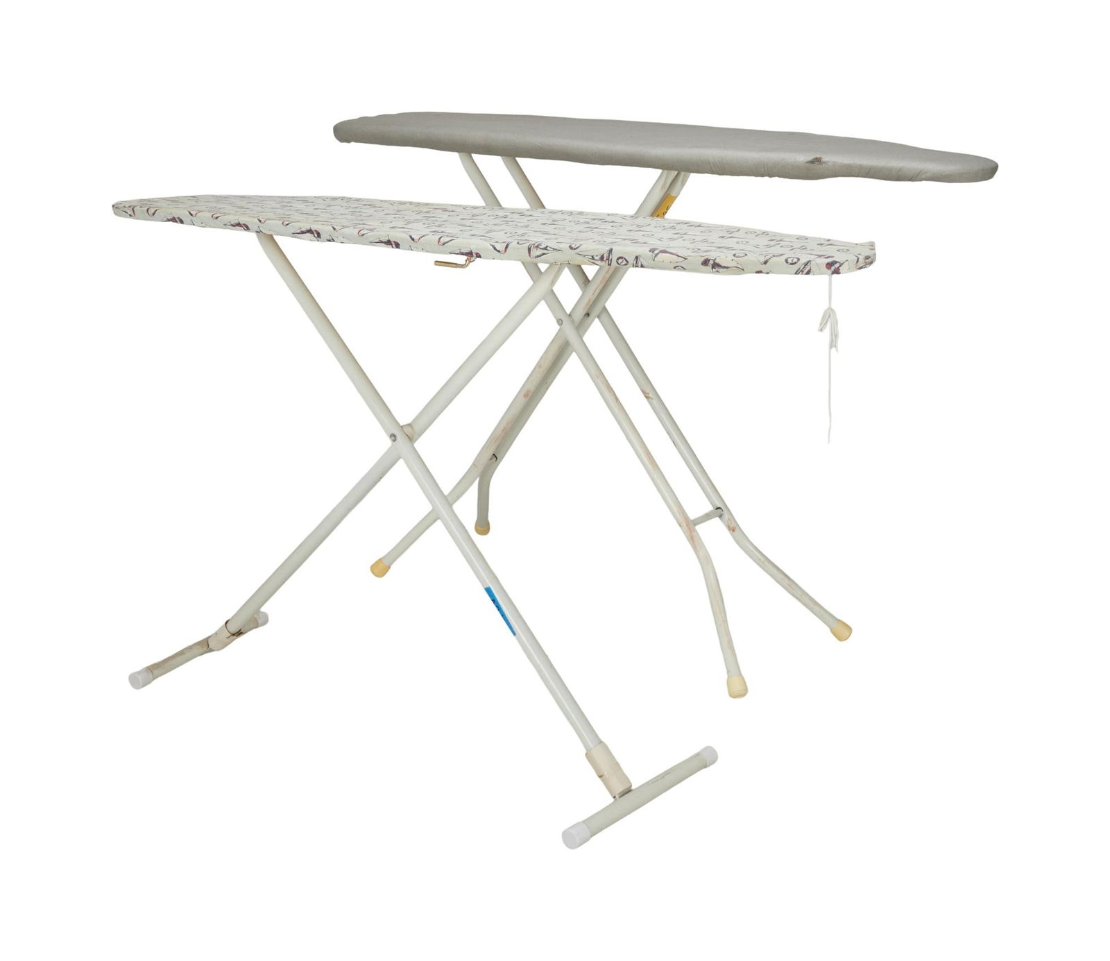 David Lynch | Two Ironing Boards: Two ironing boards. One with gray board cover, one with sailboat pattern board cover. Tape with handwriting is present on the legs of each board, blue tape on the board with sailboat cover with "
