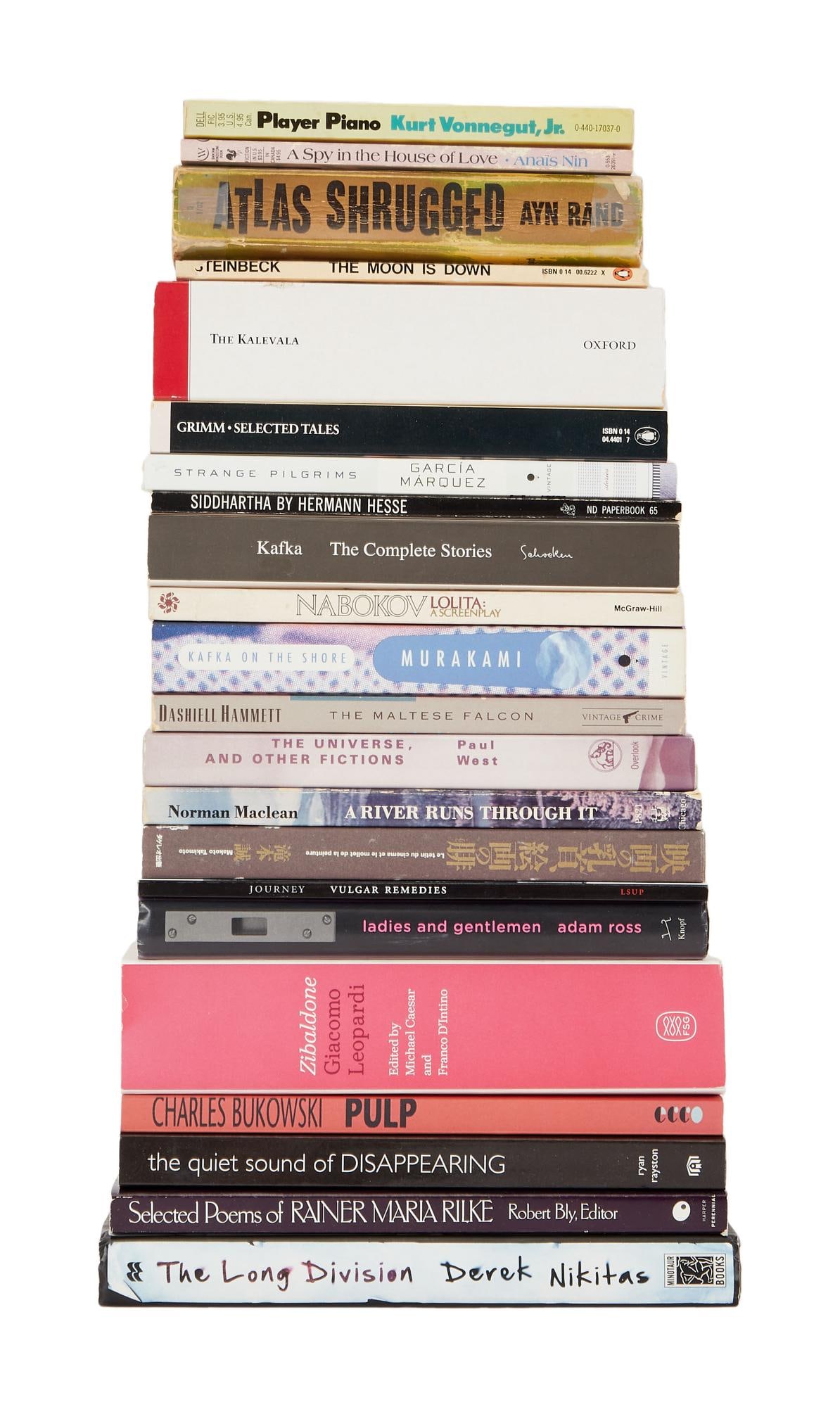 David Lynch | Paperback Literature Books: A group of paperback literature books from the personal home collection of David Lynch, bearing a "Studio David Lynch" stamp. The titles include: Atlas Shrugged, The Universe and Other