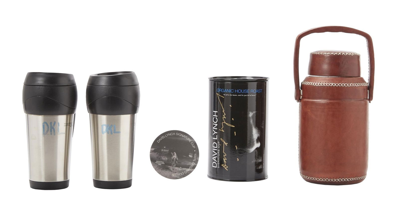 David Lynch | Travel Coffee Mugs and Other Items: A group of four; including two travel coffee mugs both with a handwritten annotation reading "DKL" [David Keith Lynch] likely used on set; a tan leather-covered Thermos; and a canister (now