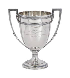 Rudolph Valentino | 1924 Sterling Silver Loving Cup by Tiffany & Co.: A large piece of classic design; elegant detailing on handles; front engraved &quot;Presented To / Rudolph Valentino / By / The Theatre Owners Chamber of Commerce / January 24, 1924&quot;; bottom hall