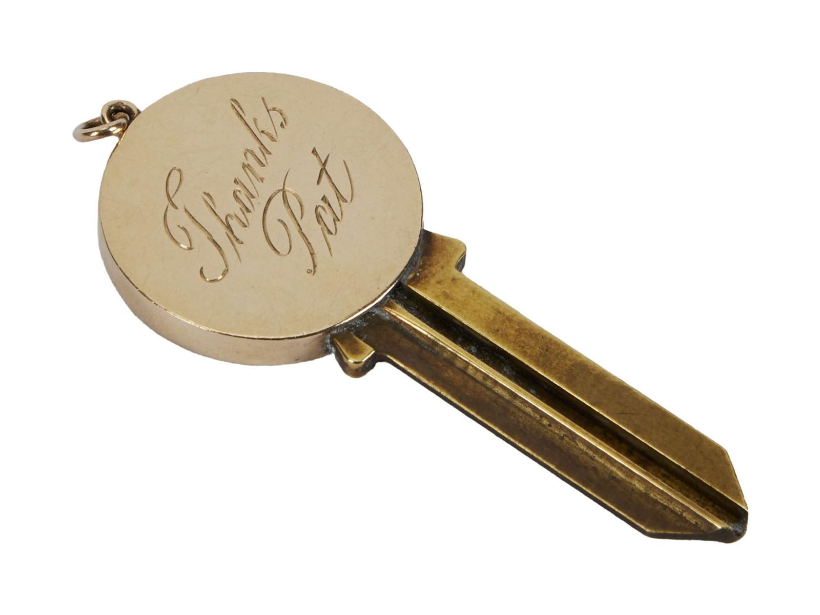 Pat Boone | 1962 14K Gold Key Cap Related to "State Fair": 20th Century Fox, 1962; a standard house key with a gold cap portion (which is soldered on), engraved on front "DB" and on back "Thanks / Pat," further marked on side "14k,&qu