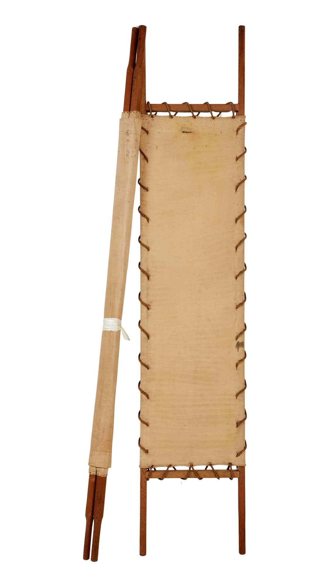 Gone With The Wind | 1939 Stretchers for the Wounded and Dead (II): Metro-Goldwyn-Mayer, 1939; a group of two; the first made of tan canvas affixed to a wood frame by rope; the second somewhat similar in style but affixed to a wood frame by heavy-duty tacks; both in p