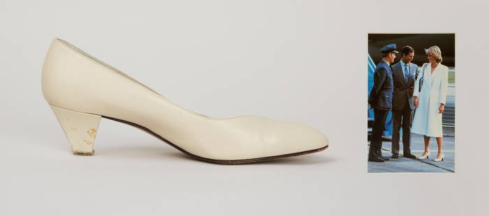 Princess Diana | 1981 Bruno Magli Cream Leather Pumps (With Postcard): A pair of matte leather cream-colored pumps designed by Bruno Magli, belonging to Diana, Princess of Wales. Diana wore these shoes in September 1981 while arriving at RAF Lossiemuth in Scotland