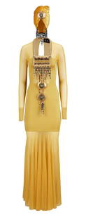 Whitney Houston | 1994 "Whitney: The Concert for A New South Africa" Marc Bouwer Reproduction Gown: A reproduction Saffron gold embellished gown by Marc Bouwer with a matching emb