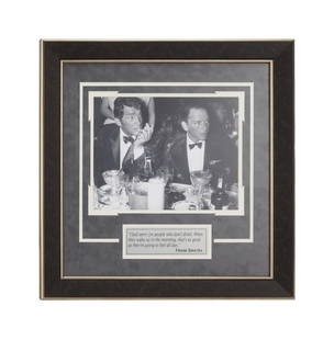 Larry King | 2000s Frank Sinatra and Dean Martin Black and White Photograph: A nice display piece; depicting an image of the two crooners at a dinner wearing tuxedos, matted below is a plaque that has a funny quote Sinatra said about people who don&#39;t drink. Matted and Fram