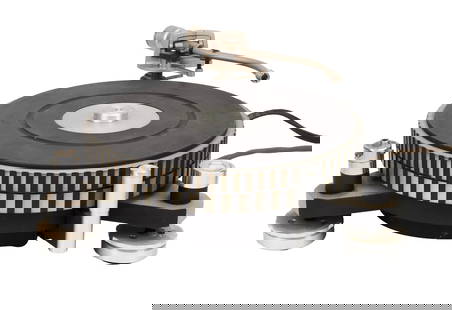 Florian Schneider | Micro Seiki DDX-1000 turntable: A Micro Seiki DDX-1000 turntable with a Technics EPA-100 tonearm (serial number: 3605). The additional two footers of the unit were utilized with an Audio Technica spirit level, and an Audio Technica