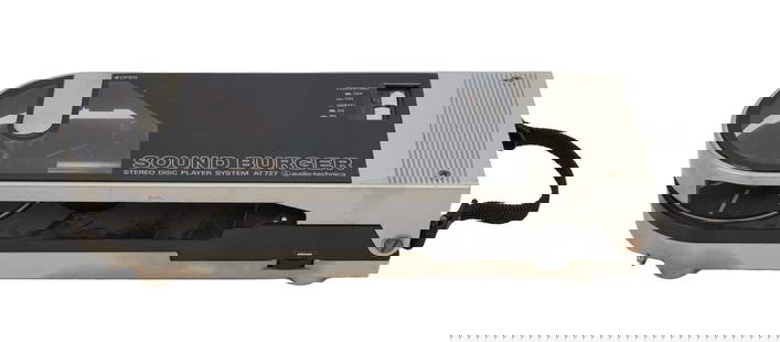 Florian Schneider | Audio-Technica AT727 Sound Burger Turntable: An Audio-Technica AT727 "Sound Burger" turntable. 2.5 x 11.5 x 4 inches PROVENANCE From the Estate of Florian Schneider