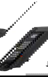 Florian Schneider | 1990s Motorola Portable Phone: A c. 1990s unbranded Motorola (Model CCCN4031A) portable phone from the home of Kraftwerk founding member, Florian Schneider.Introduced in 1992 in Germany, the phone features a handle for easy