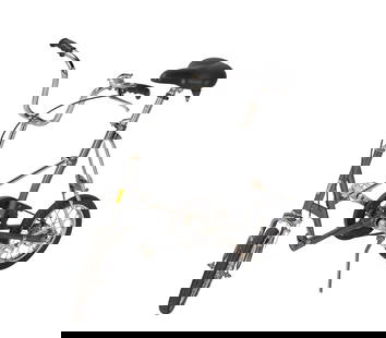 Florian Schneider | Mini-Bicycle: An original compact city bicycle from the personal collection of Kraftwerk founding member, Florian Schneider.This bicycle features a Bridgestone rubber belt driving chain, and a bell mounted on the