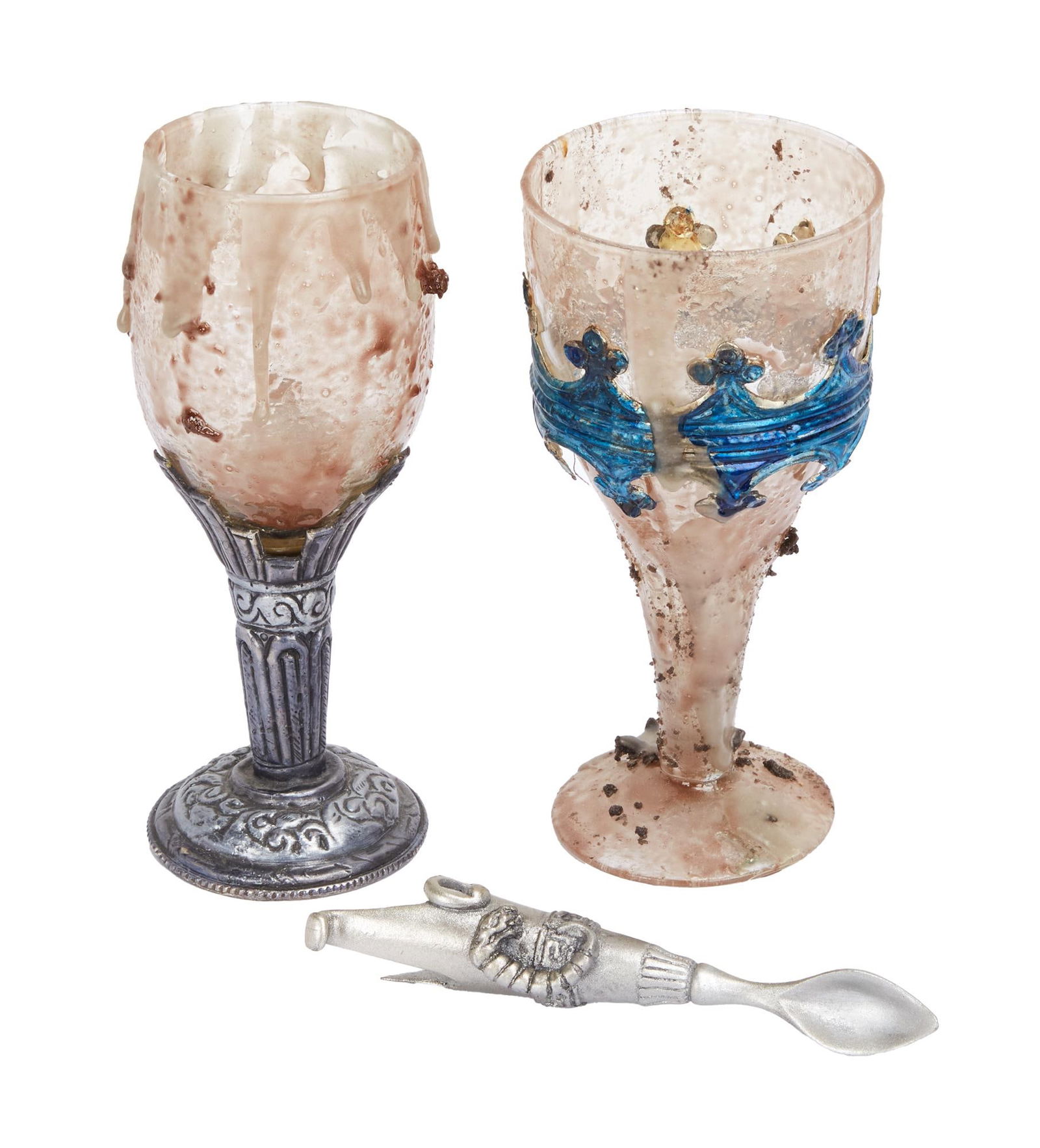 The Dark Crystal: Age of Resistance | Skeksis Banquet Cup and Utensil Props (C): An original group of props including two tall goblets and a spoon from the Skeksis banquet scenes from the production of the television series The Dark Crystal: Age of Resistance (Netflix, 2019). 