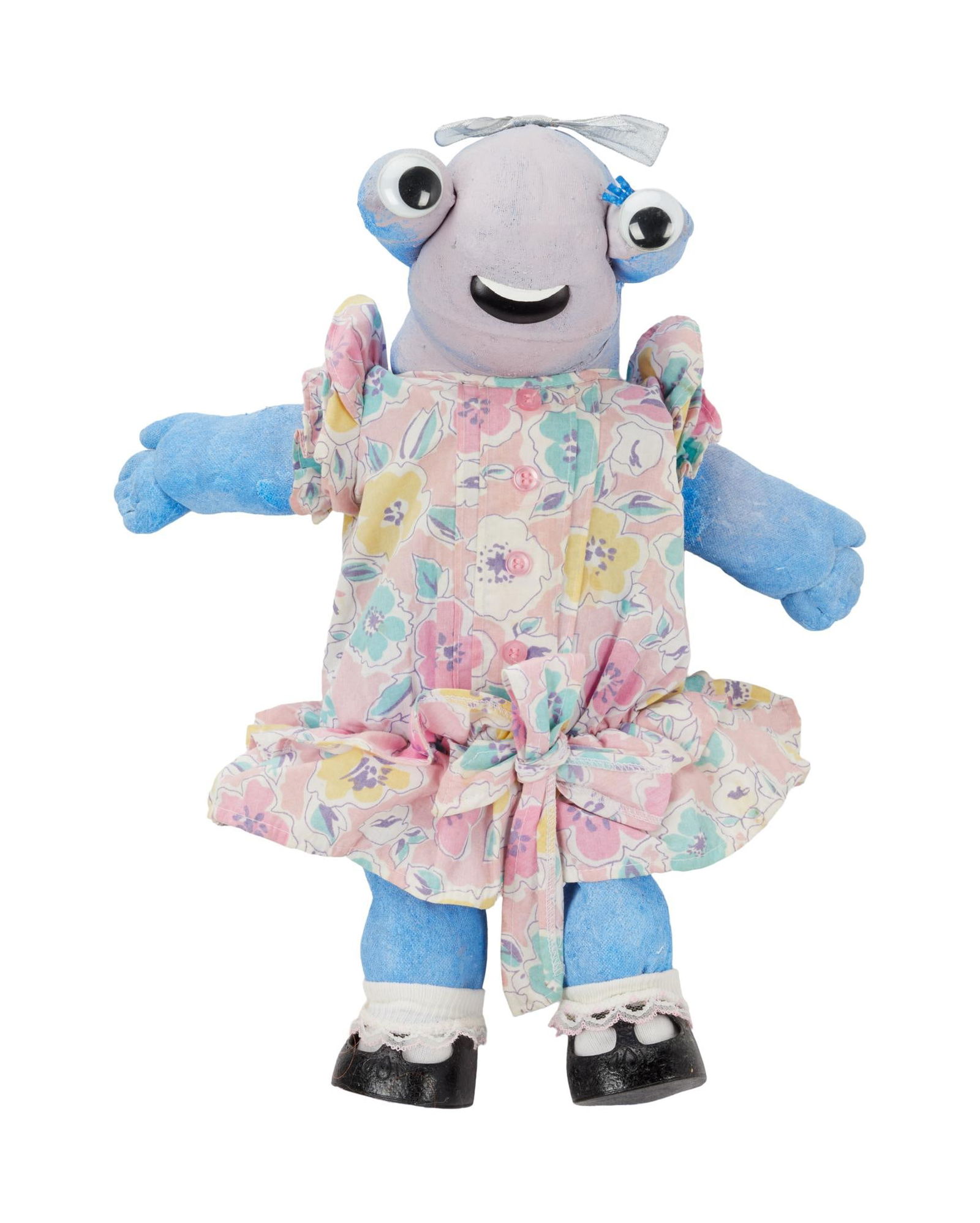 Aliens in the Family | Children's Doll Prop: An original doll prop from the production of the television series Aliens in the Family (ABC, 1996). The doll is composed of a painted canvas material that is filled. The doll also features goog