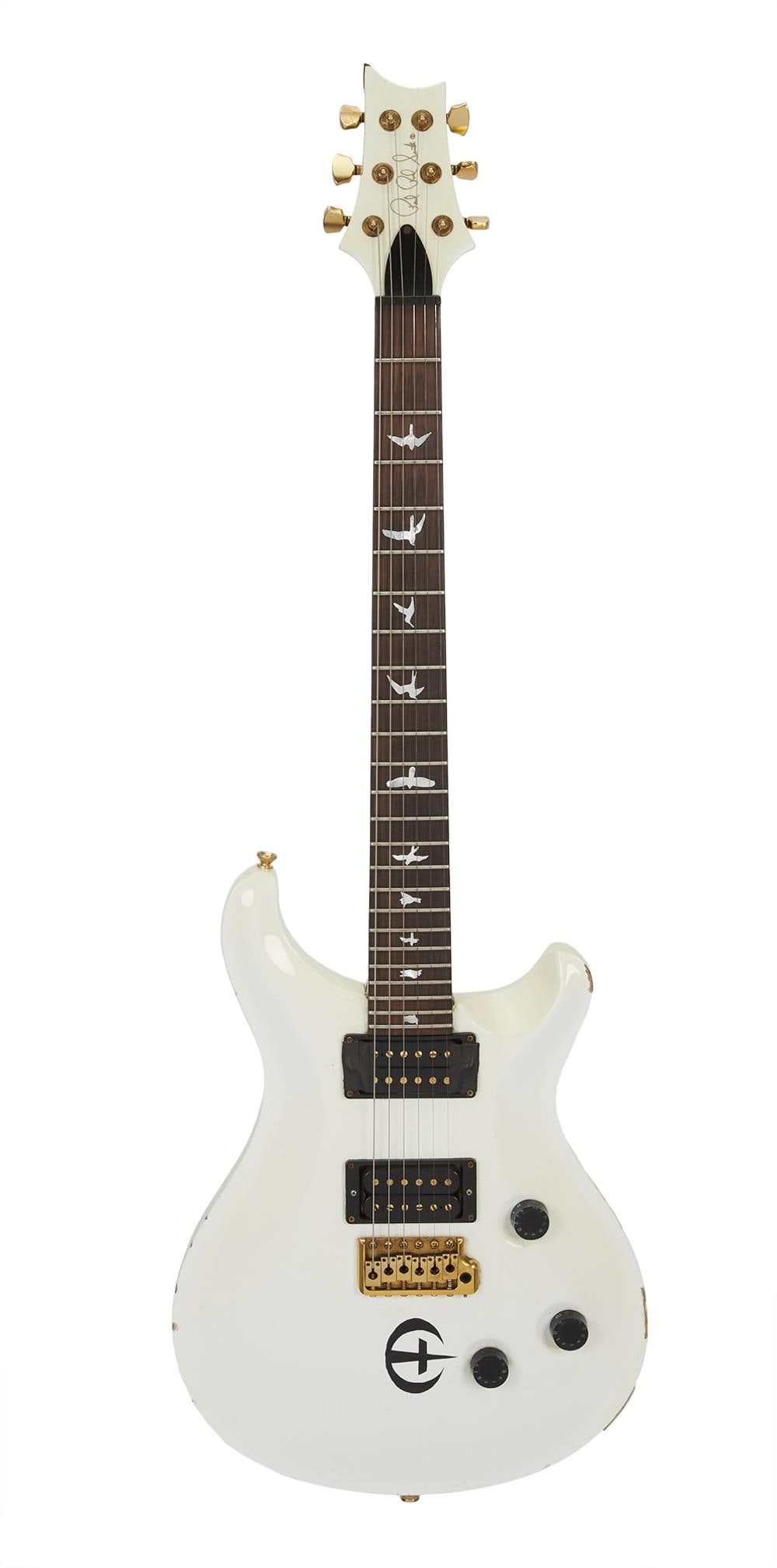 Dave Navarro | Stage Played PRS Dave Navarro and Kat Von D Owned Electric Guitar, White: A stage played 2003 Paul Reed Smith Custom 24 electric guitar, serial #3 77201, in white finish. Custom built for Dave Navarro of Jane’s Addiction and Red Hot Chili Peppers fame, the guitar is s