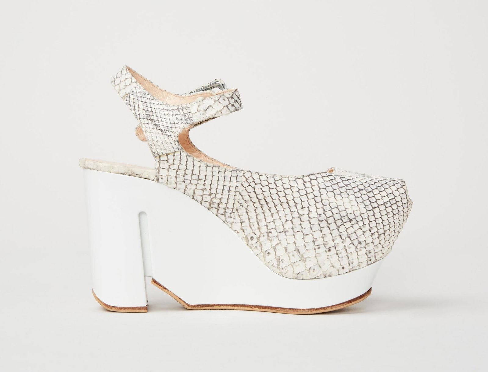 Calvin Klein Collection | Francisco Costa Resort 2013 Runway Platforms: A pair of Calvin Klein Collection snake-embossed leather peep-toe platforms designed for the resort 2013 runway collection during Francisco Costa's tenure as creative director. The sandals feature