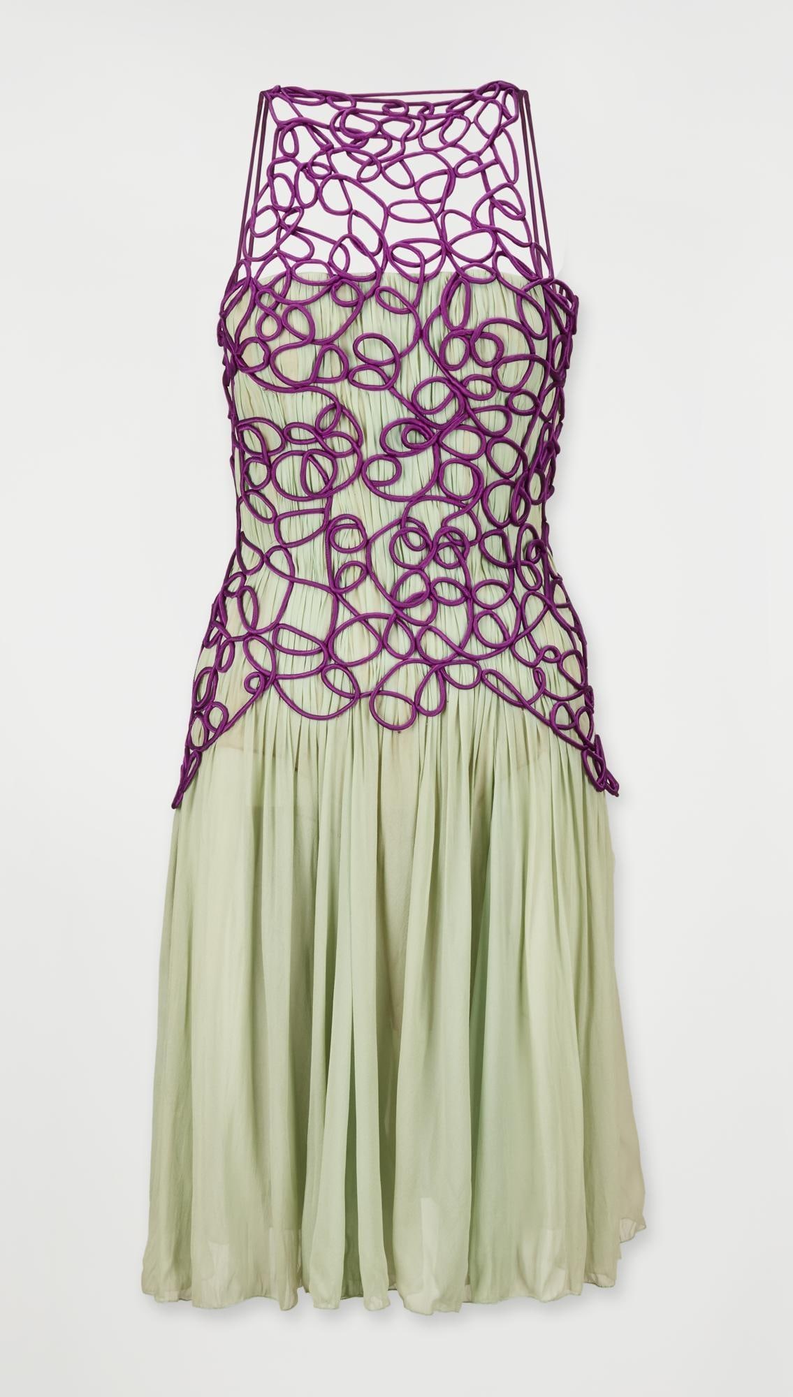 Atelier Versace | Spring/Summer 2000 Chiffon Evening Dress: This is an Atelier Versace spring-summer haute couture cocktail dress from the 2000 runway collection, designed by Donatella Versace. The dress is made of sea foam green silk crepe with purple silk co