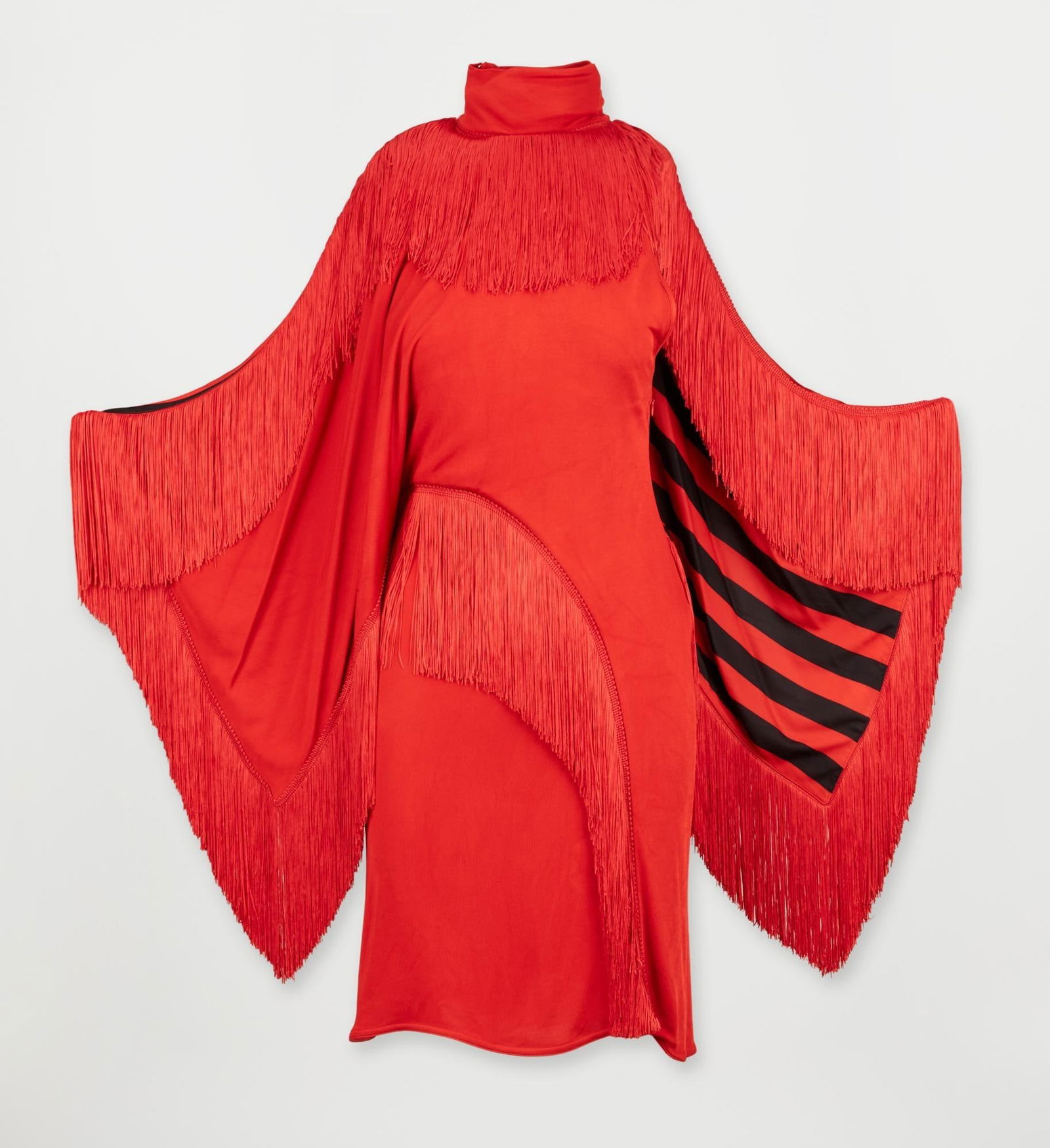 Givenchy | 2017 Spring Runway Red Fringe Dress: This is a Givenchy cocktail dress with bright red fringe embellishment, designed by Ricardo Tisci for the 2017 look 48 from the spring runway collection. The design is a bodycon rayon knit with a turt