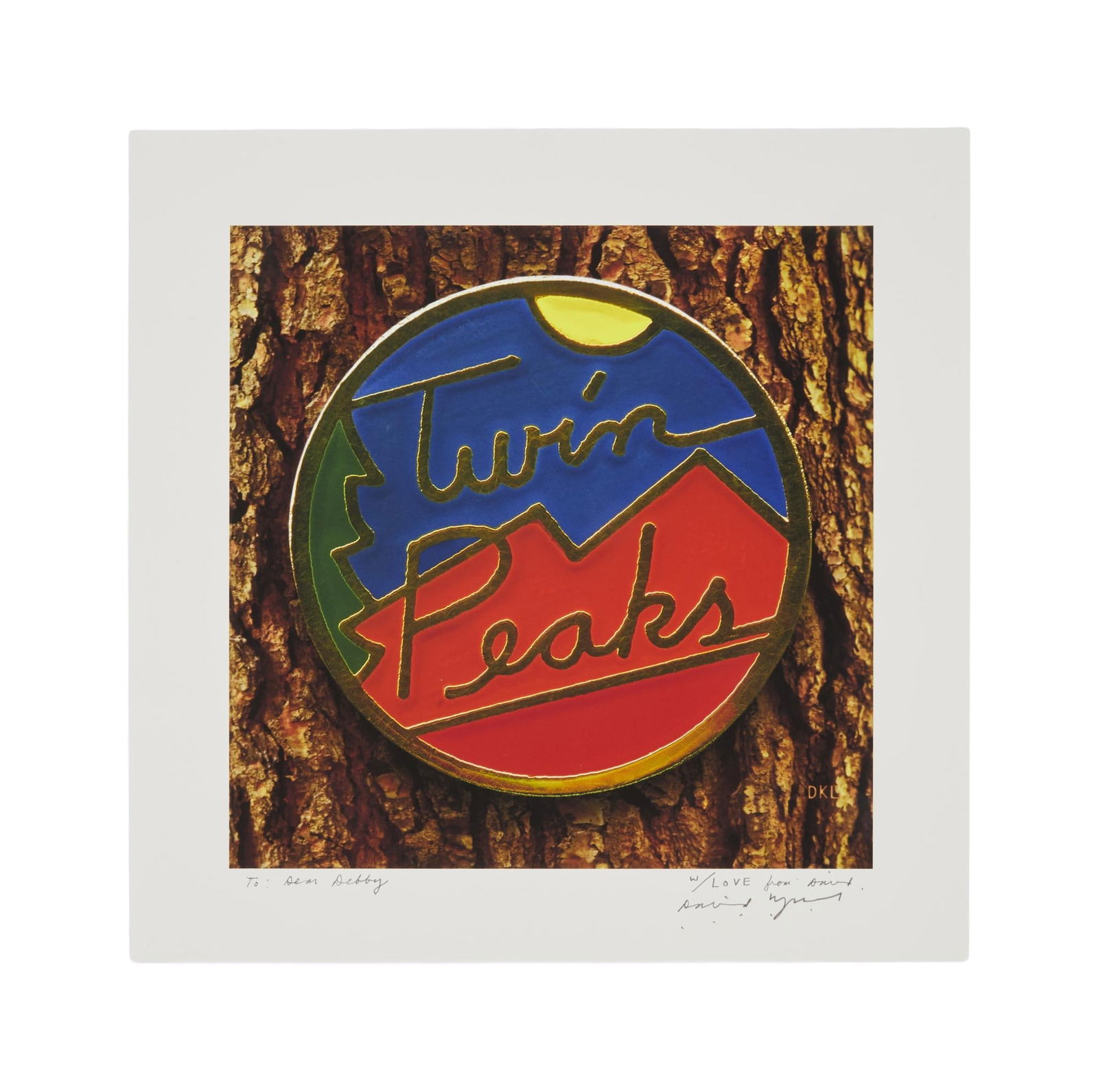 Twin Peaks | David Lynch Signed Photo Print: A photographic art print of the David Lynch-designed "Twin Peaks" insignia. The print is signed and inscribed in pencil by Lynch for his longtime former assistant, Debby Trutnik. The inscrip