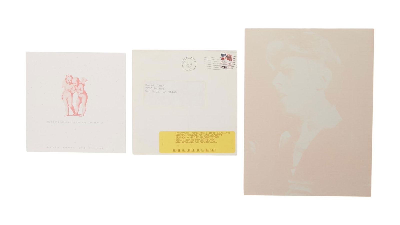 David Lynch | David Bowie Holiday Card and Photo Print: A 1991 holiday card from "David Bowie and Isolar" in an envelope addressed to David Lynch. The envelope also contains a sender notice sticker of new address to recipient, which is Lynch-Fros