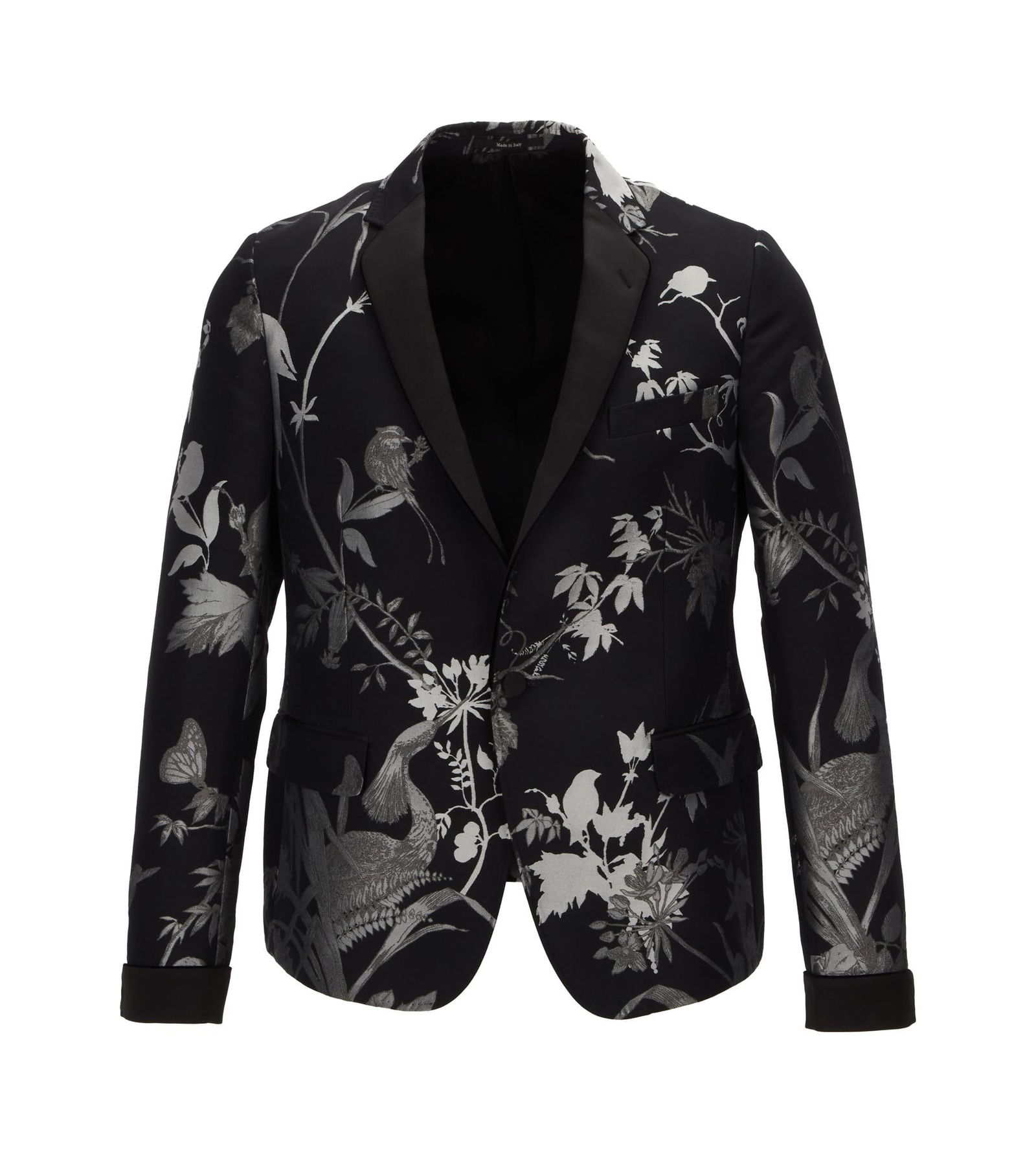 Joe Walsh | Gucci Floral Print Blazer: A black silk-blend blazer by Gucci featuring a silver metallic floral pattern throughout, as well as two back vents, two front pockets, a single breast pocket, and a single interior pocket. Labe