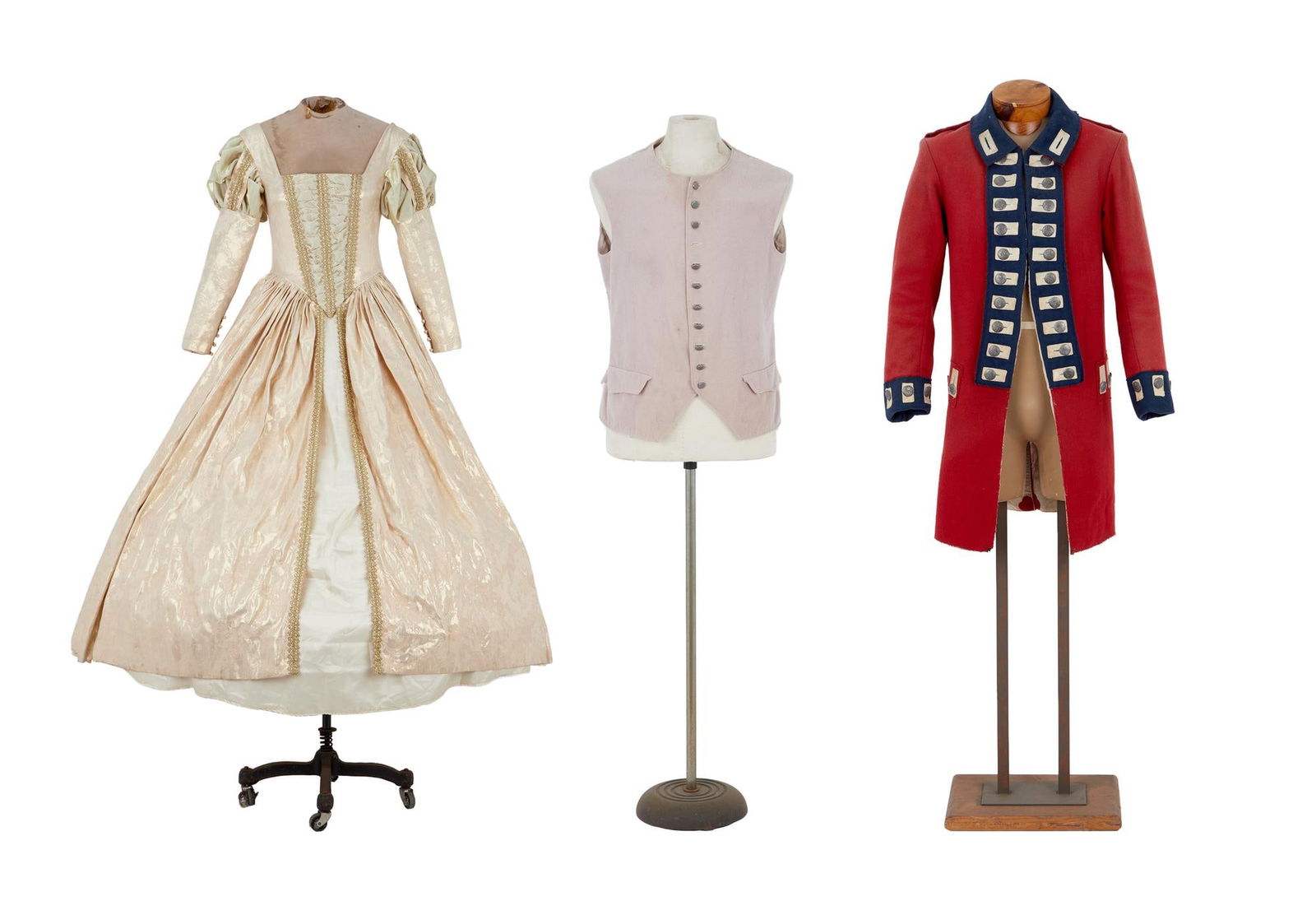 Cutthroat Island | Production Costume Group: A set of three costume items from Cutthroat Island (Carolco Pictures, 1995). The first is a vest made of a light mauve fabric, with heavy metal buttons and two false pocket patches in front. The secon