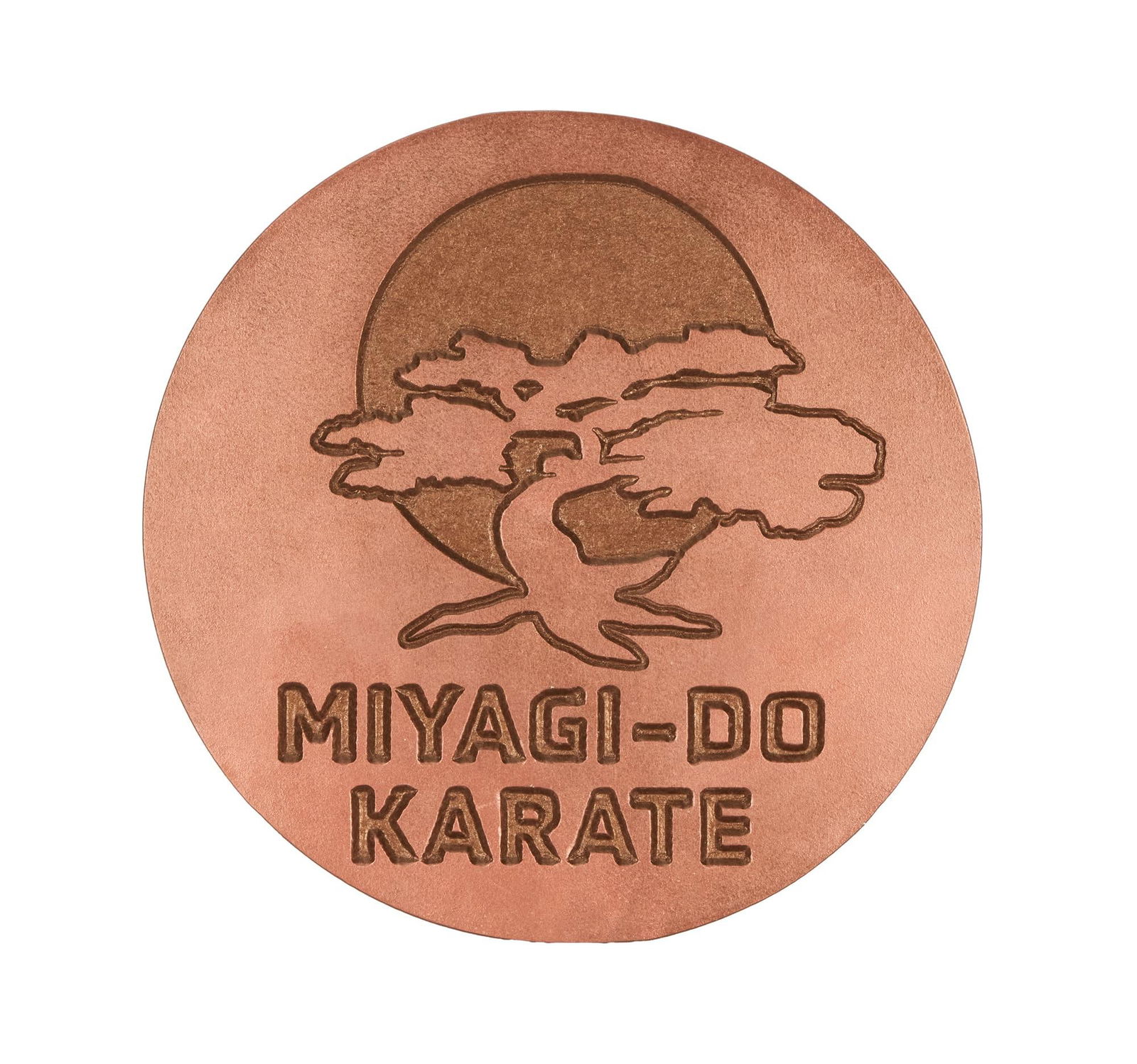 Cobra Kai | "Miyagi-Do Karate" Cast and Crew Gift Sign: Bronze-tone sign featuring a bonsai tree and rising sun logo with the text, "Miyagi-Do Karate." Item was a gift to cast and crew for Cobra Kai (Sony Pictures Television, 2018-2025)