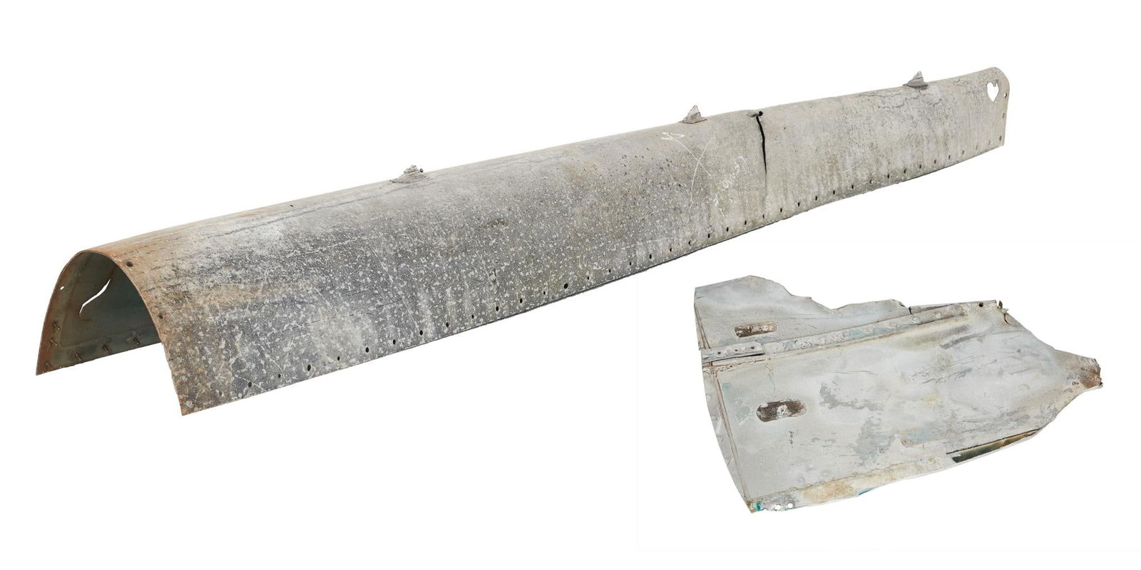 Lost | Two Oceanic Airlines Flight 815 Plane Crash Pieces: Two Oceanic Airlines Flight 815 plane crash pieces from the production of the television series Lost (ABC, 2004 - 2010). Crash pieces such as these were seen strewn about the beach of t