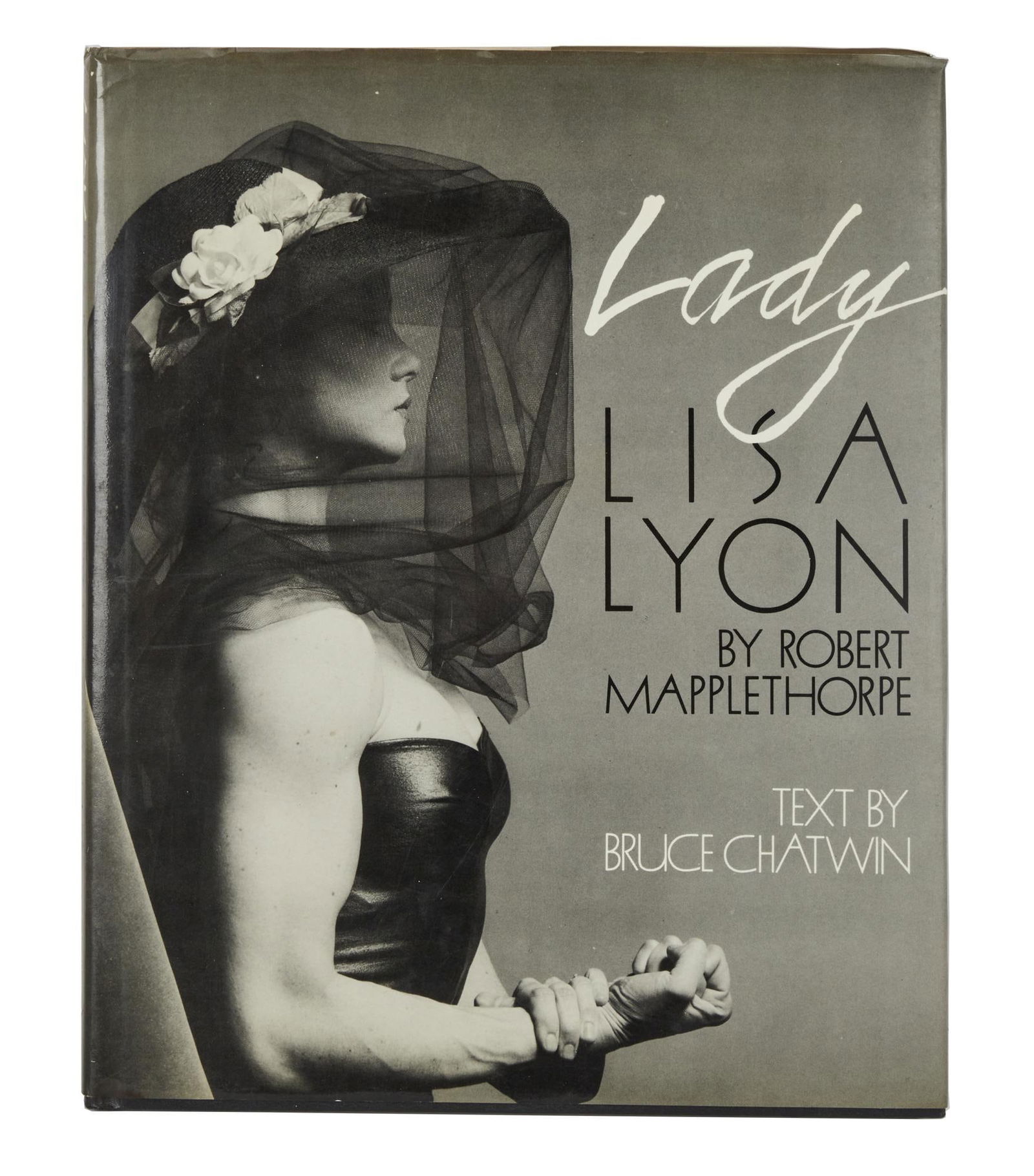 Harry Dean Stanton | Lisa Lyon and Robert Mapplethorpe Signed and Inscribed "Lady" Book: A copy of the book Lady: Lisa Lyon by Robert Mapplethorpe (The Viking Press, 1983), signed and inscribed for Harry Dean Stanton by Lyon and Mapplethorpe. Both signatures on the inside cover