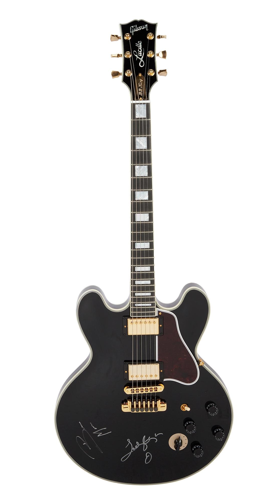 Lady Gaga and Bruno Mars | Signed Gibson B.B. King Lucille Semi-Hollowbody Electric Guitar, Black: A 2016 Gibson B.B. King Lucille electric guitar, serial #10066722, in black finish. The guitar is signed by both Lady Gaga and Bruno Mars on the guitar’s top in silver felt tip pen. The B.B. Kin