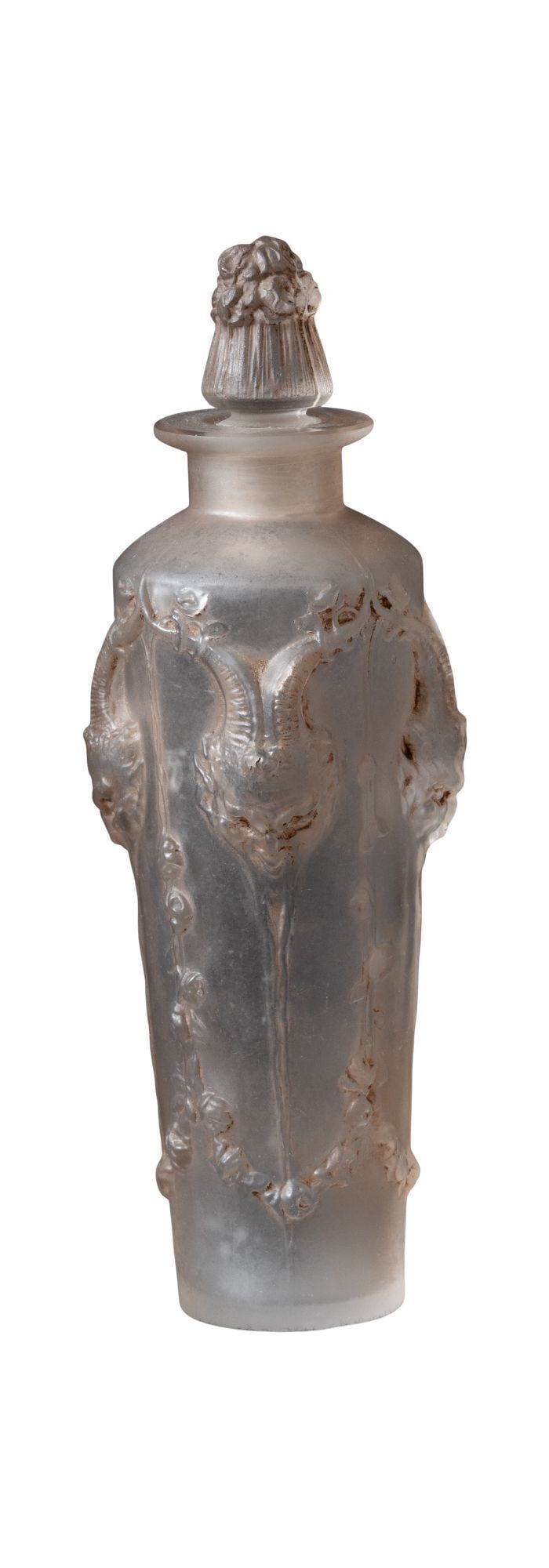 Whoopi Goldberg | R. Lalique Pan Perfume Flask: An R. Lalique frosted and patinated glass perfume flagon and stopper originally designed in 1920. With engraved "R. Lalique France" and "No. 504" marks. LITERATURE: Marcilhac no. 5