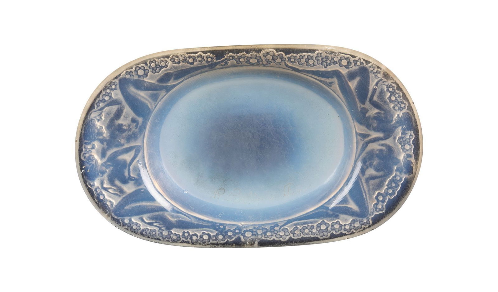 Whoopi Goldberg | R. Lalique Medicis Cendrier: A molded and frosted opalescent glass cendrier or ashtray with rounded corners, originally designed in 1924. With engraved "R. Lalique France " and molded "R. Lalique" marks. LITERATURE: Marcilhac no.