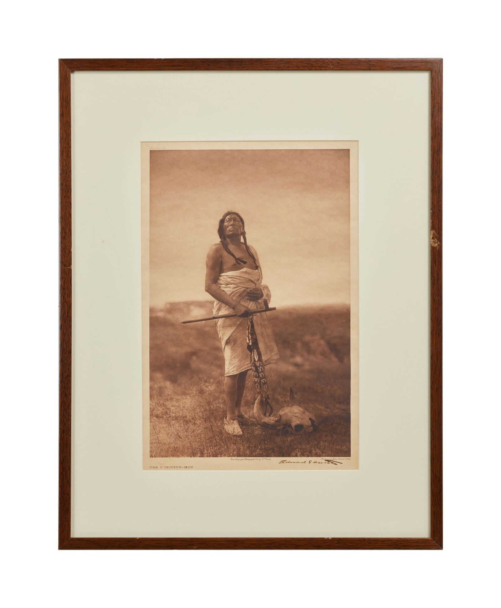 Whoopi Goldberg | Signed Edward S. Curtis Medicine Man Photogravure: A framed Edward S. Curtis, John Andrew & Sons photogravure, "Medicine Man," Plate 76, 1907, signed "Edward S. Curtis " lower right. Please note: The piece exhibits some scattered staining. Sight 16.75