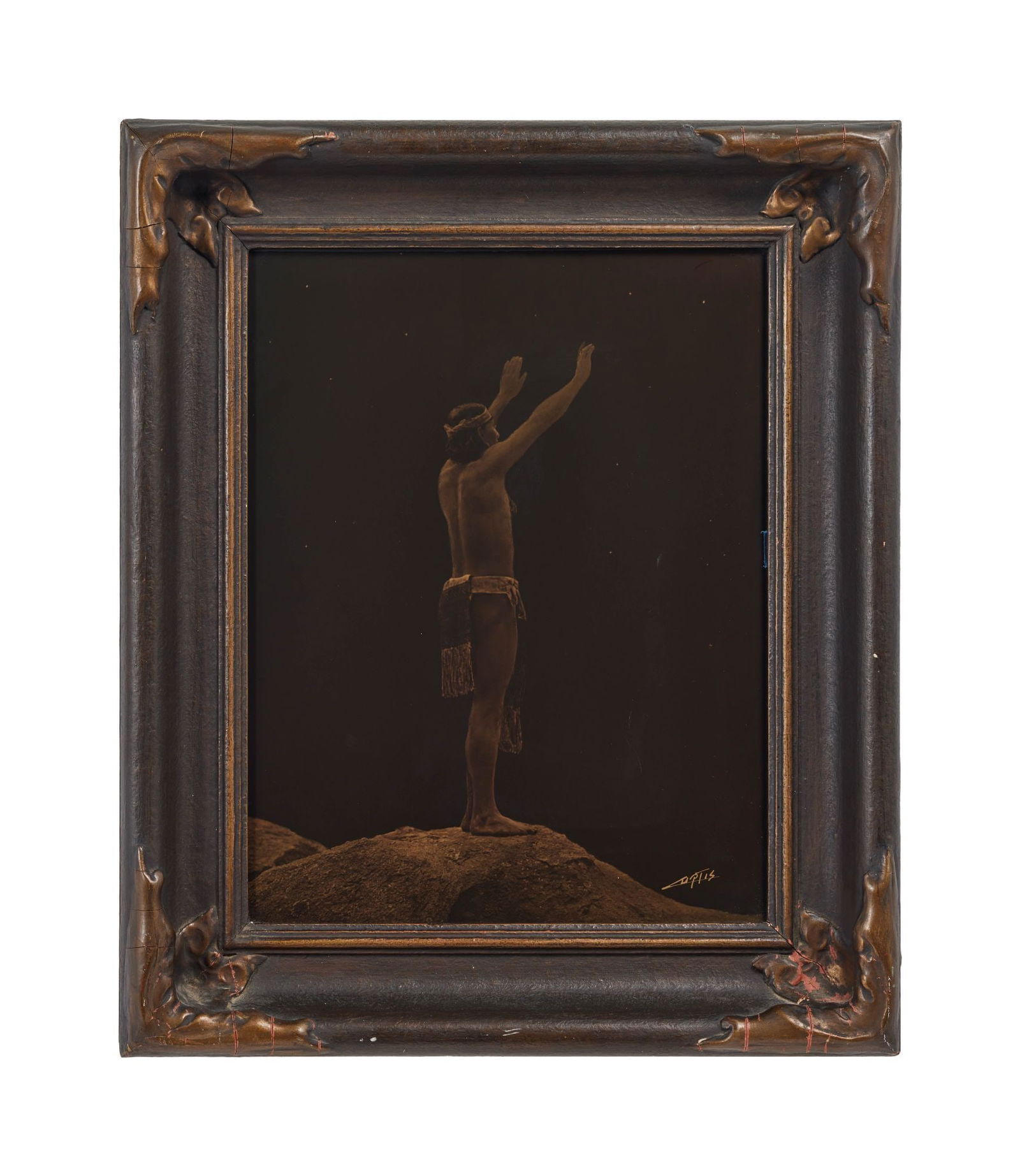 Whoopi Goldberg | Edward S. Curtis "Prayer to the Stars" Orotone: Edward S. Curtis (American 1868-1952) "Prayer to the Stars," 1909, signed in the image lower right, housed in original Curtis Studio frame, Curtis Studio label affixed to the frame backing. Sight: 13.