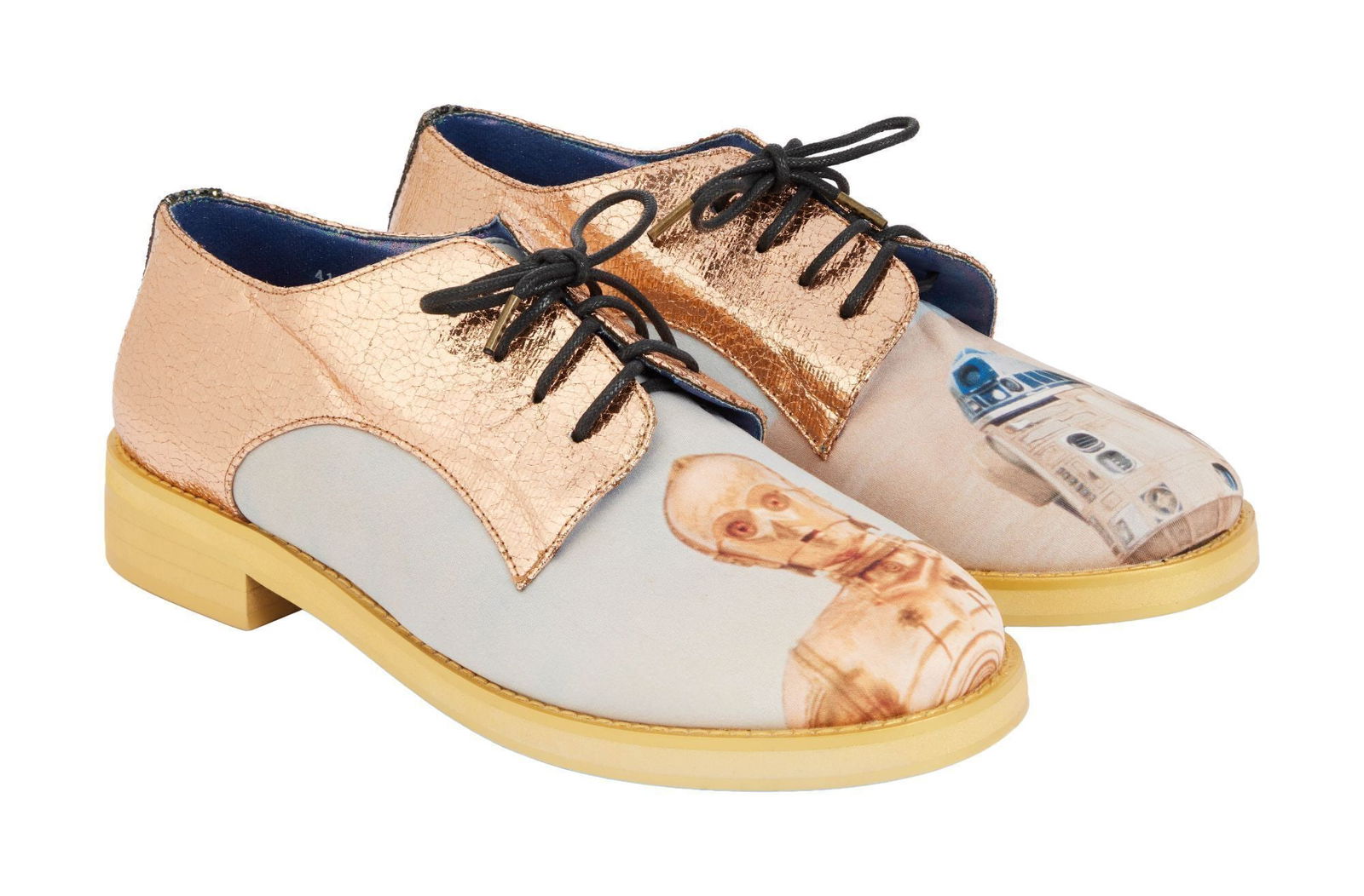 Whoopi Goldberg | 2015 "The View" Worn "Star Wars" Theme Shoes: A pair of Star Wars-themed Oxford style shoes worn by Whoopi Goldberg on season 19 of The View (ABC 1997-present). The metallic copper-colored shoes feature R2-D2 and C-3PO on the toes and Princess Le