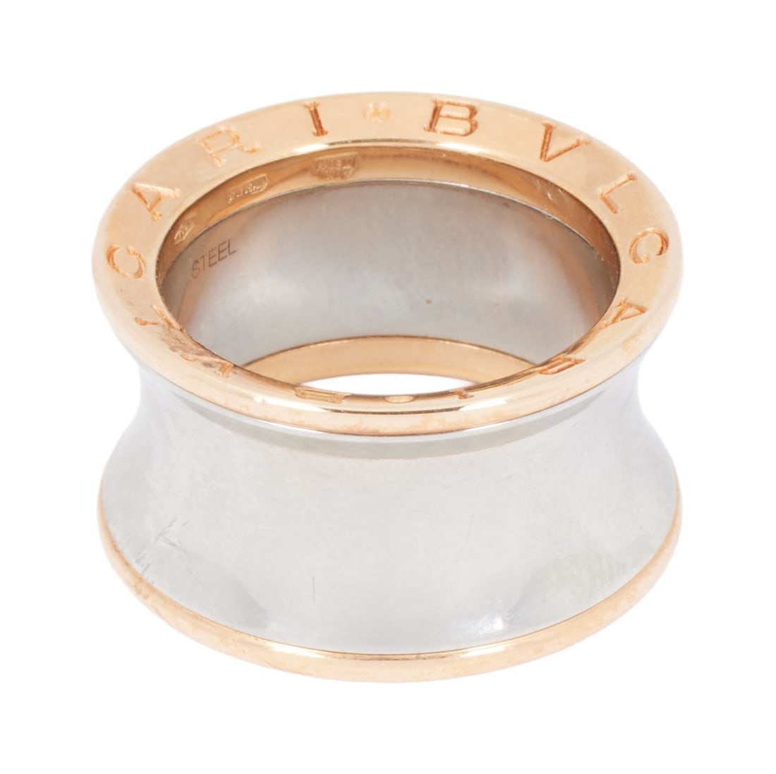 Whoopi Goldberg | Bulgari 18k Rose Gold and Steel B. Zero1 Anish Kapoor Ring Band: The wide-curving steel band enhanced by 18k rose gold borders engraved "BVLGARI," 11.0 grams, ring size 7 (54). Marked Bulgari on exterior, interior 750, Made in Italy, steel no FC05820 54.Goldbe