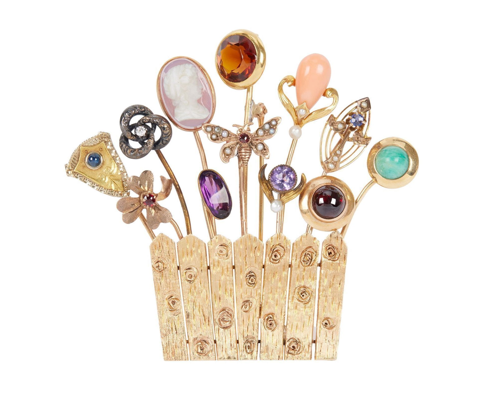 Whoopi Goldberg | 14k Yellow Gold Stick Pin Assemblage Brooch: Designed as a textured 14k gold picket fence section with a series of twelve various gem-set Victorian stick pins arranged as flowers, 31.4 grams, 2 3/4 x 2 1/2 inches.Unmarked Kee tested 14k gold.Not
