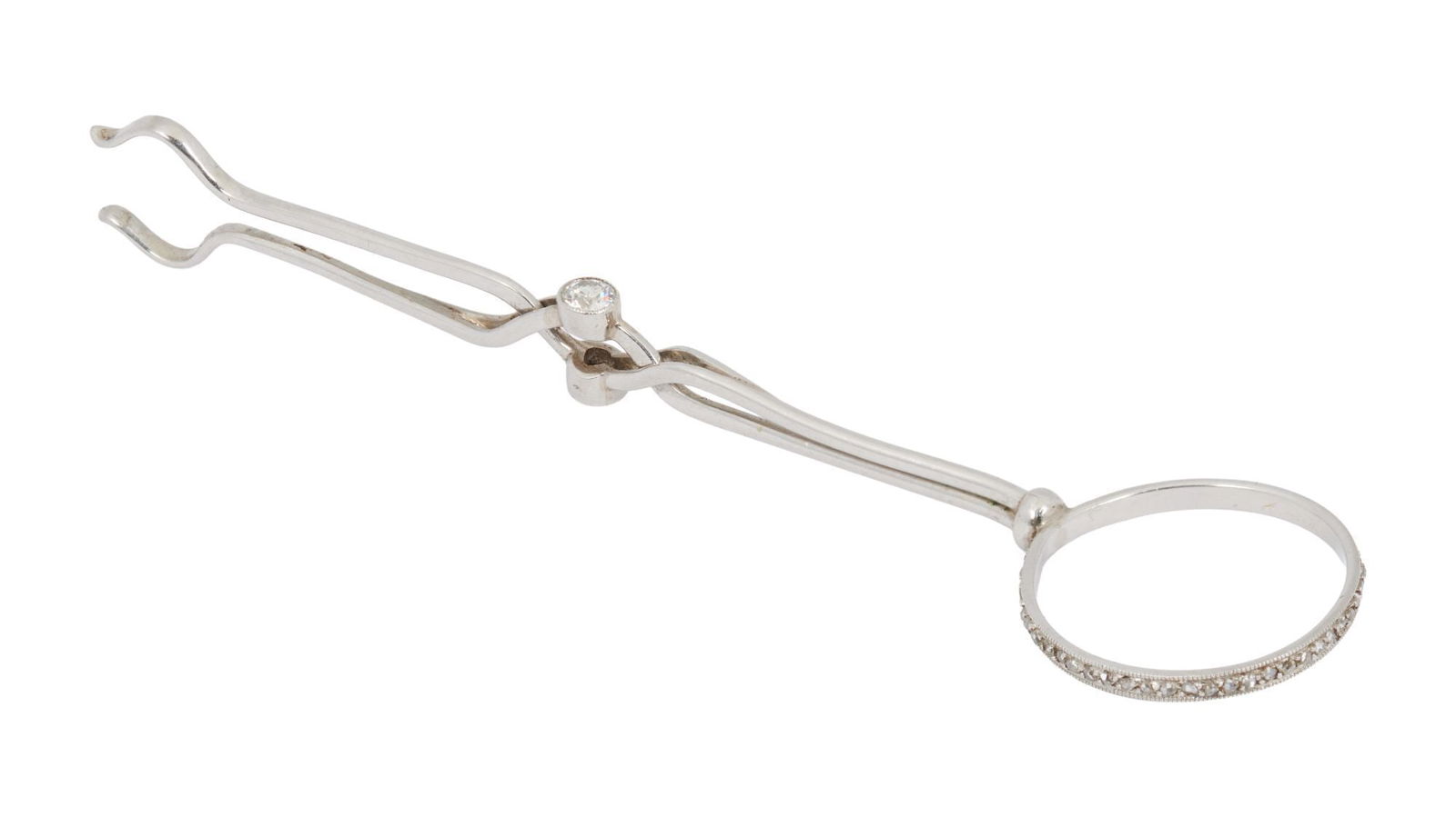 Whoopi Goldberg | Platinum And Diamond Joint/Cigarette Holder: The circular handle entirely lined with rose-cut diamonds to the diamond collet push piece, mounted in platinum, 3.5 grams, 2 3/4 inches.Unmarked Kee tested platinum.Condition: 52 rose-cut diamonds, o