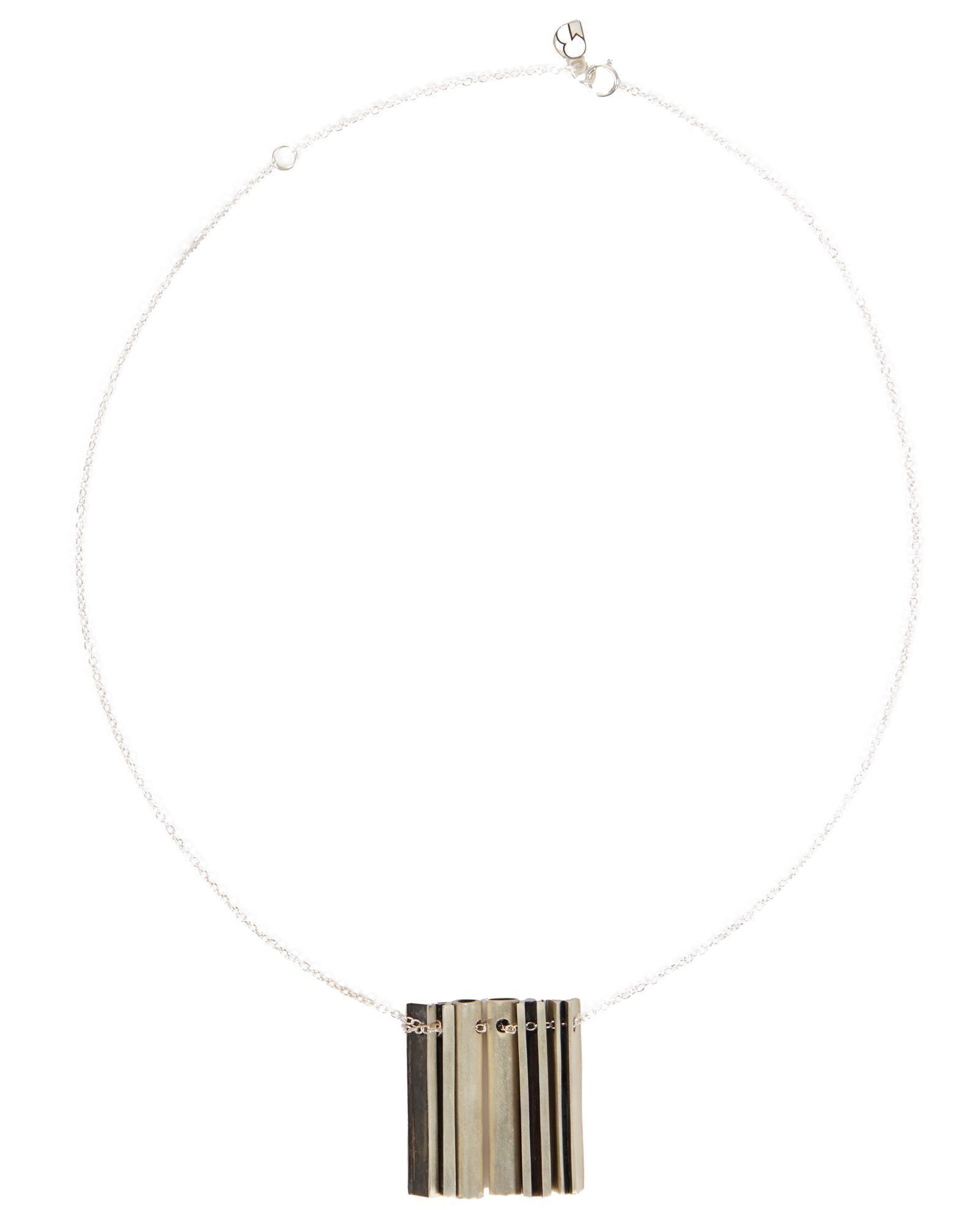 Whoopi Goldberg | Beth Macri Name Plate Necklace: The fine sterling silver link necklace suspending a series of elongated sculpted letter pendants spelling "Whoopi." 19.3 grams, 18 inches long, 1 1/8 inches pendants with tag marked BM for Beth Macri.