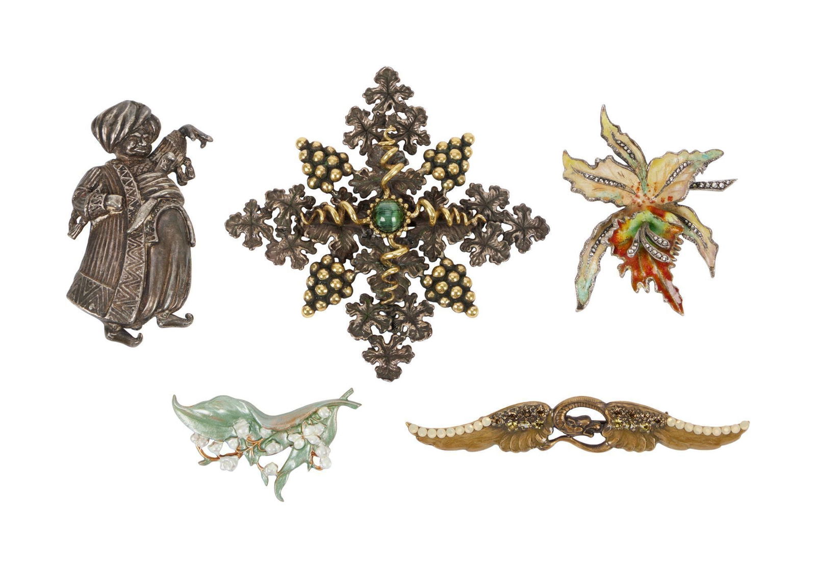 Whoopi Goldberg | Five Costume Brooches: Comprising:- A silver gilt grape leaf brooch with gold-toned grape clusters and tendrils and centering upon a green cat"?s eye cabochon, 54.3 grams, 3 1/2 x 3 1/2 inches.- An enamel lil