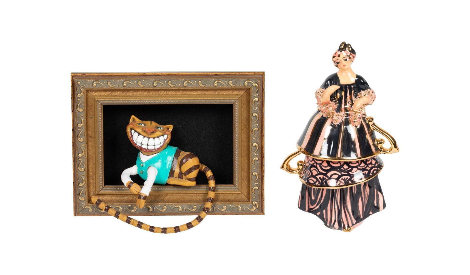 Whoopi Goldberg | Cheshire Cat in Frame and Ceramic Teacup Lady: Two ceramic artist handmade pieces, including a Lucia Friedericy clay Cheshire cat in a shadowbox frame, together with a Fugi Naim ceramic teacup lady. Each signed. Largest 9 inches high x 8.5 inches