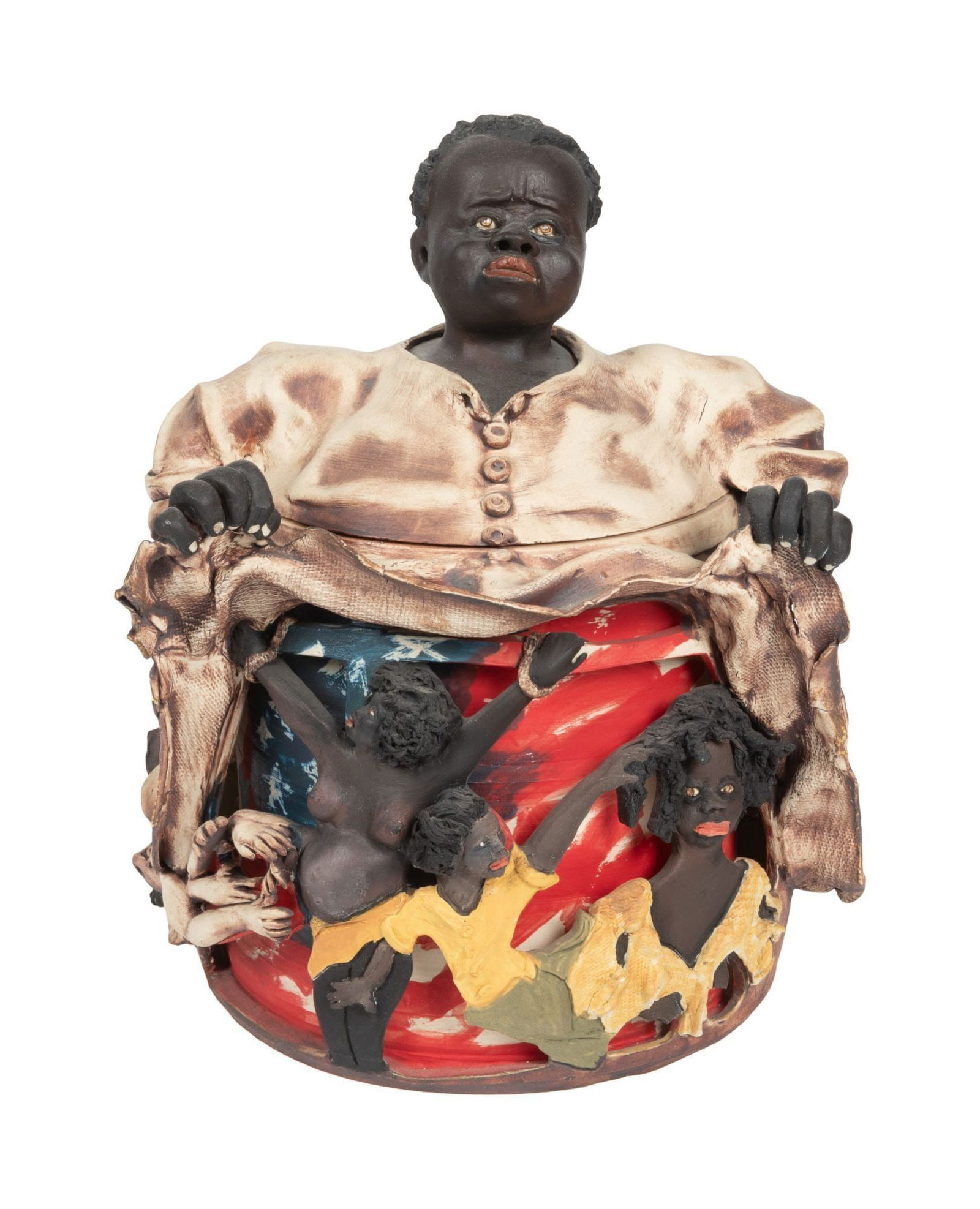 Whoopi Goldberg | Tracy Ameen Ceramic Cookie Jar Slavery Revealed: A polychrome painted ceramic figural cookie jar depicting an African American woman lifting her skirt to show other African American figures against the backdrop of an American flag. Created in tandem