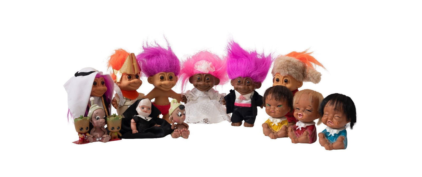 Whoopi Goldberg | Collection of Vintage Russ Trolls and Other Vinyl Dolls and Book: A group of vintage Russ Troll Dolls in assorted costumes, together with three baby figurines, two Disney characters, and two Groot figurines.LITERATURE: Whoopi Goldberg: The Unqualified Hostess (NY: R
