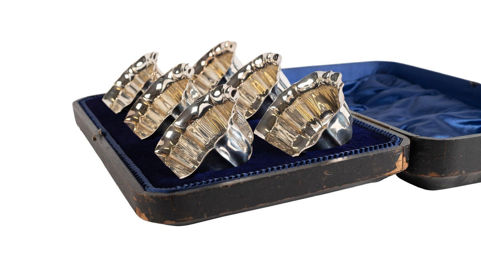 Whoopi Goldberg | Six Sterling Bowls in Fitted Case: A set of six Edwardian sterling open bowls with scalloped edges in a velvet lined fitted case. 4.62 troy oz. With hallmarks for Sheffield 1913-14. 6 x 2 x 5.25 inches From the Collection of Whoopi